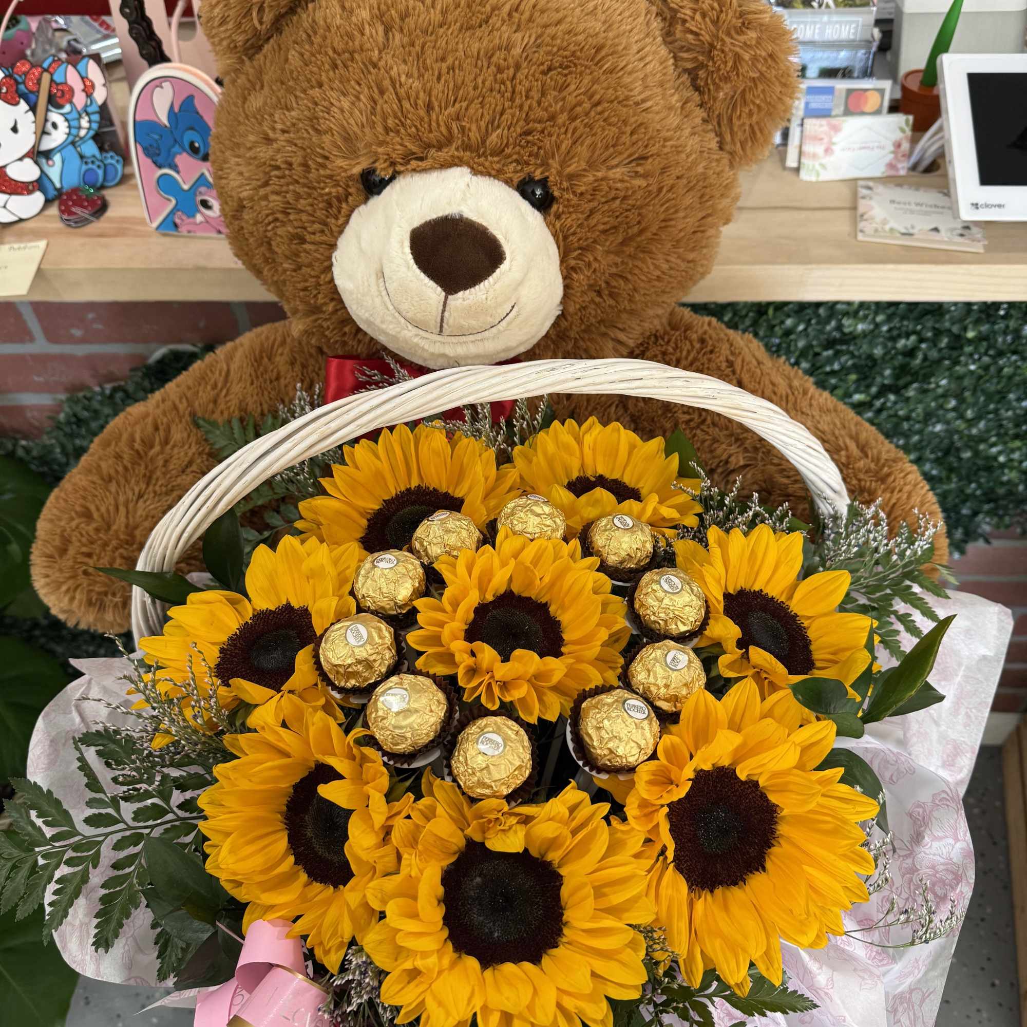 Sunflower bouquet with Ferrero Rocher chocolates and a teddy bear
