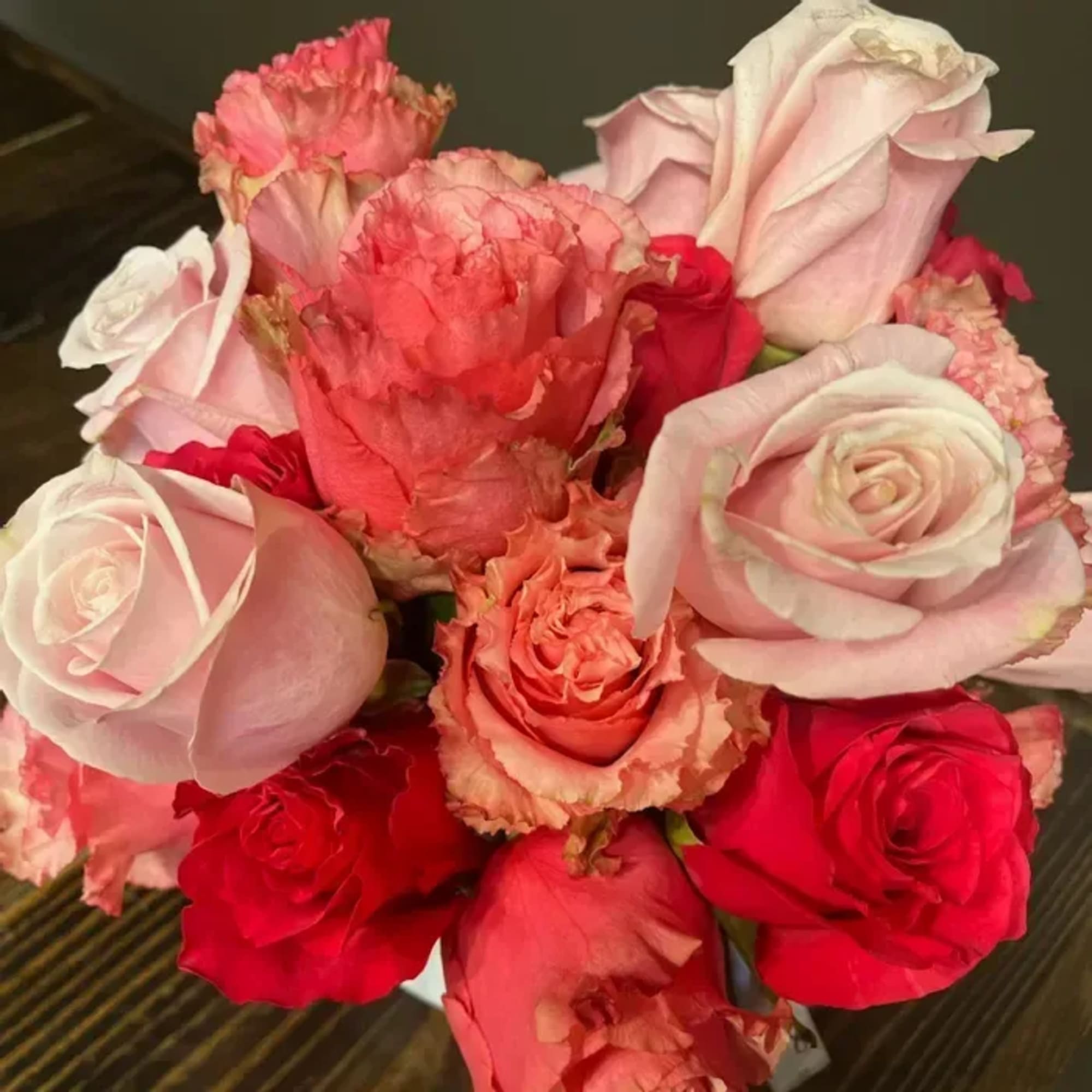 Elegant and timeless, The Laura features a stunning collection of premium roses