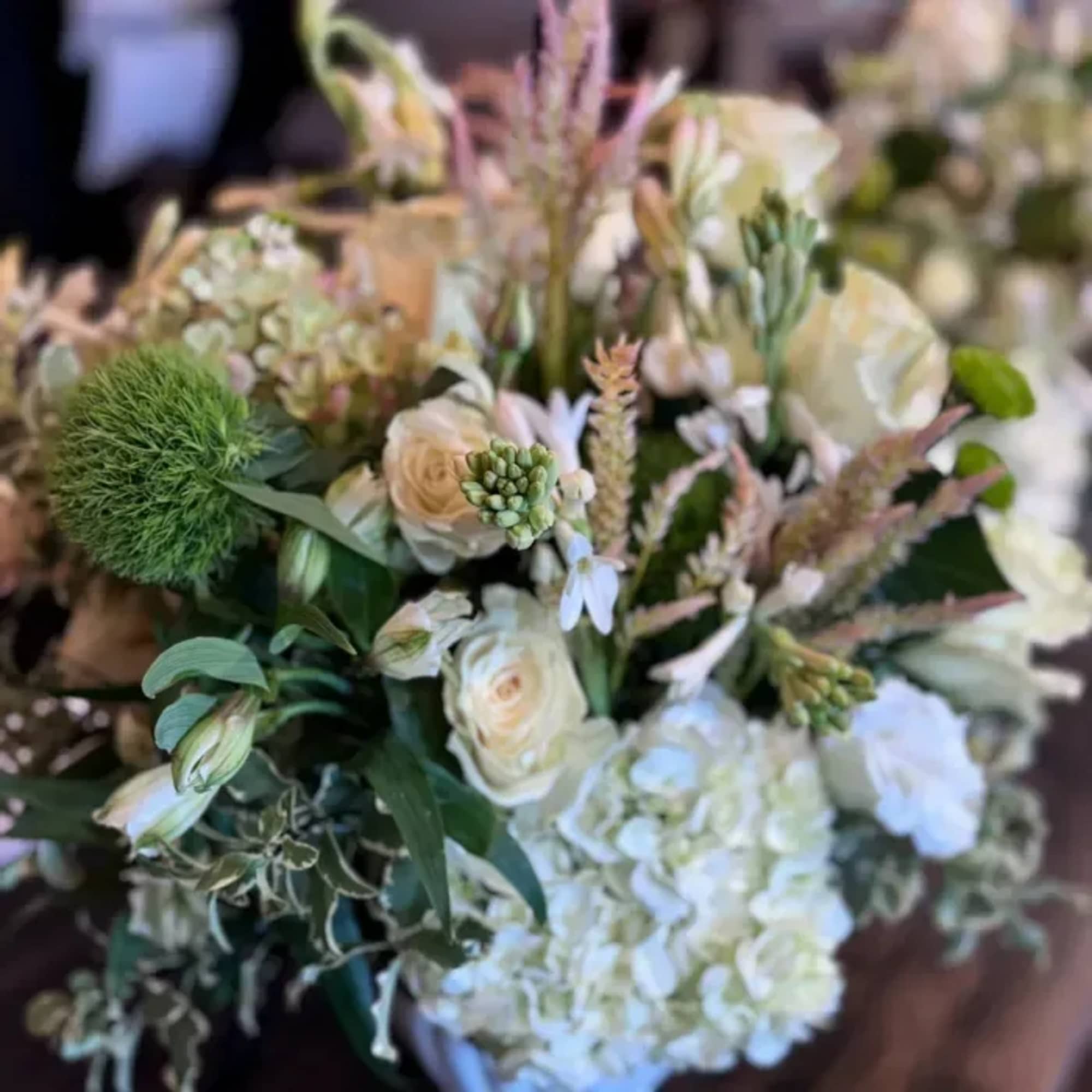 Elevate any space or occasion with our Neutrals Designer&rsquo;s Choice flower arrangement