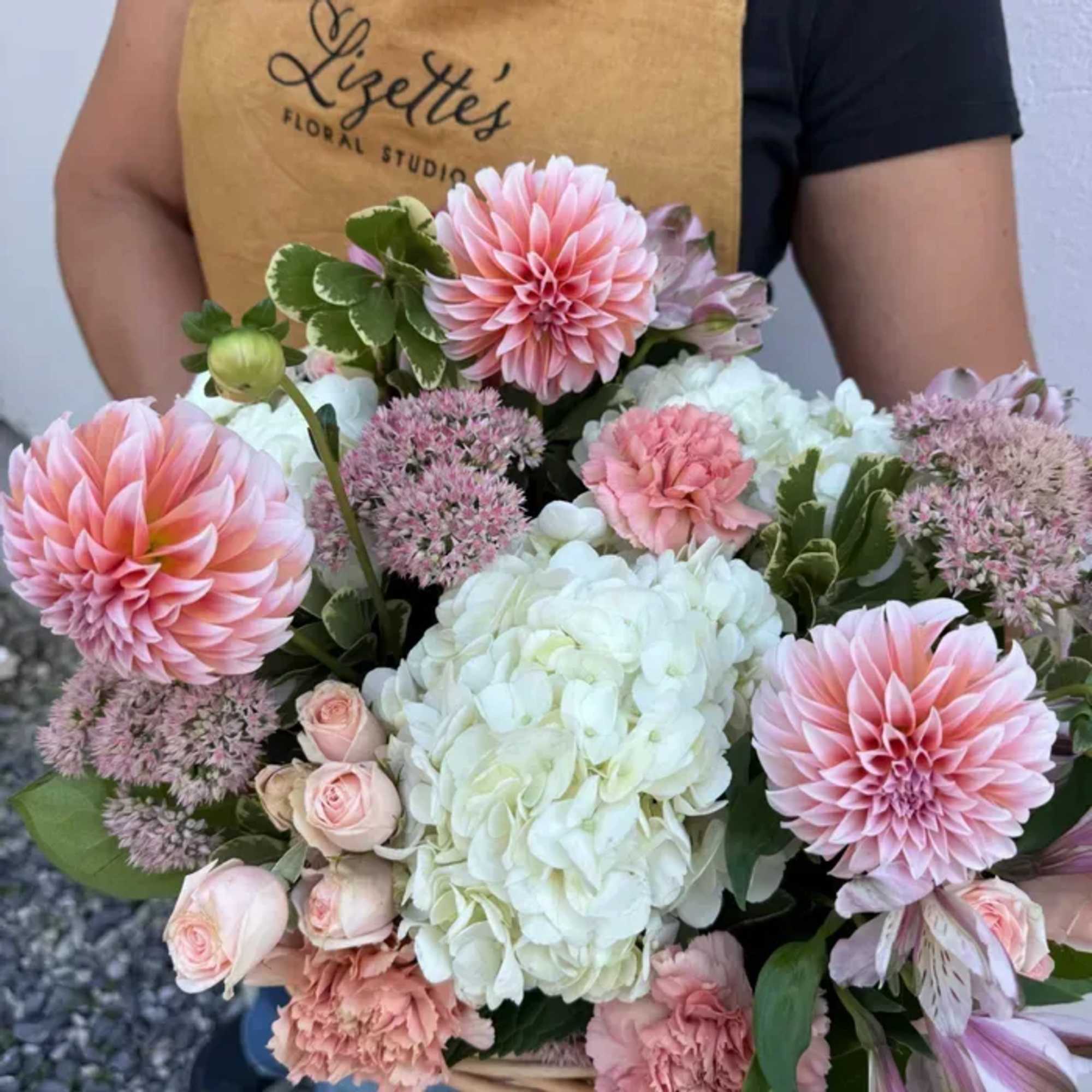 Surprise your loved ones with The Brambled, a rustic flower basket bursting