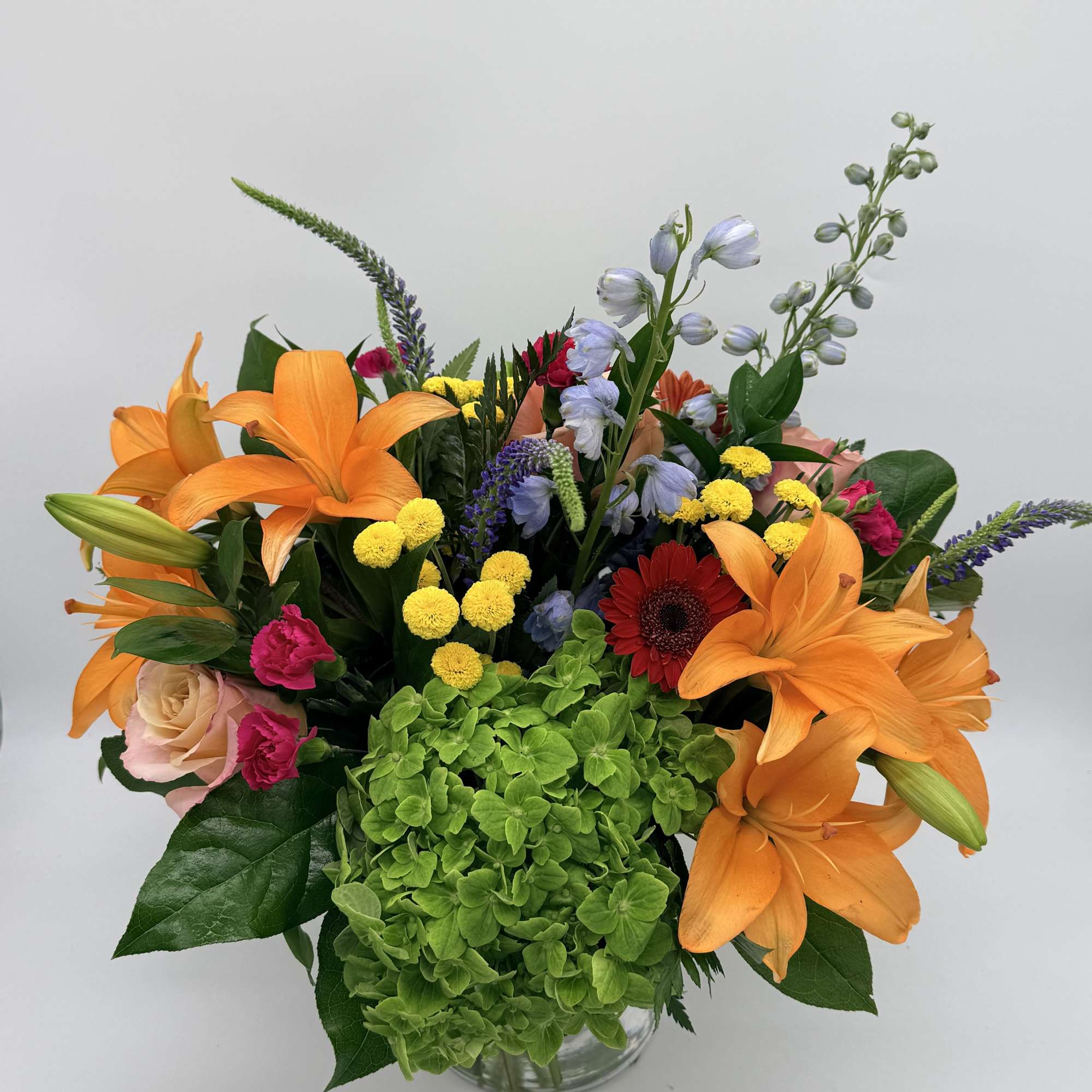 Celebrating life with colorful blooms that inspire and delight, this flower bouquet