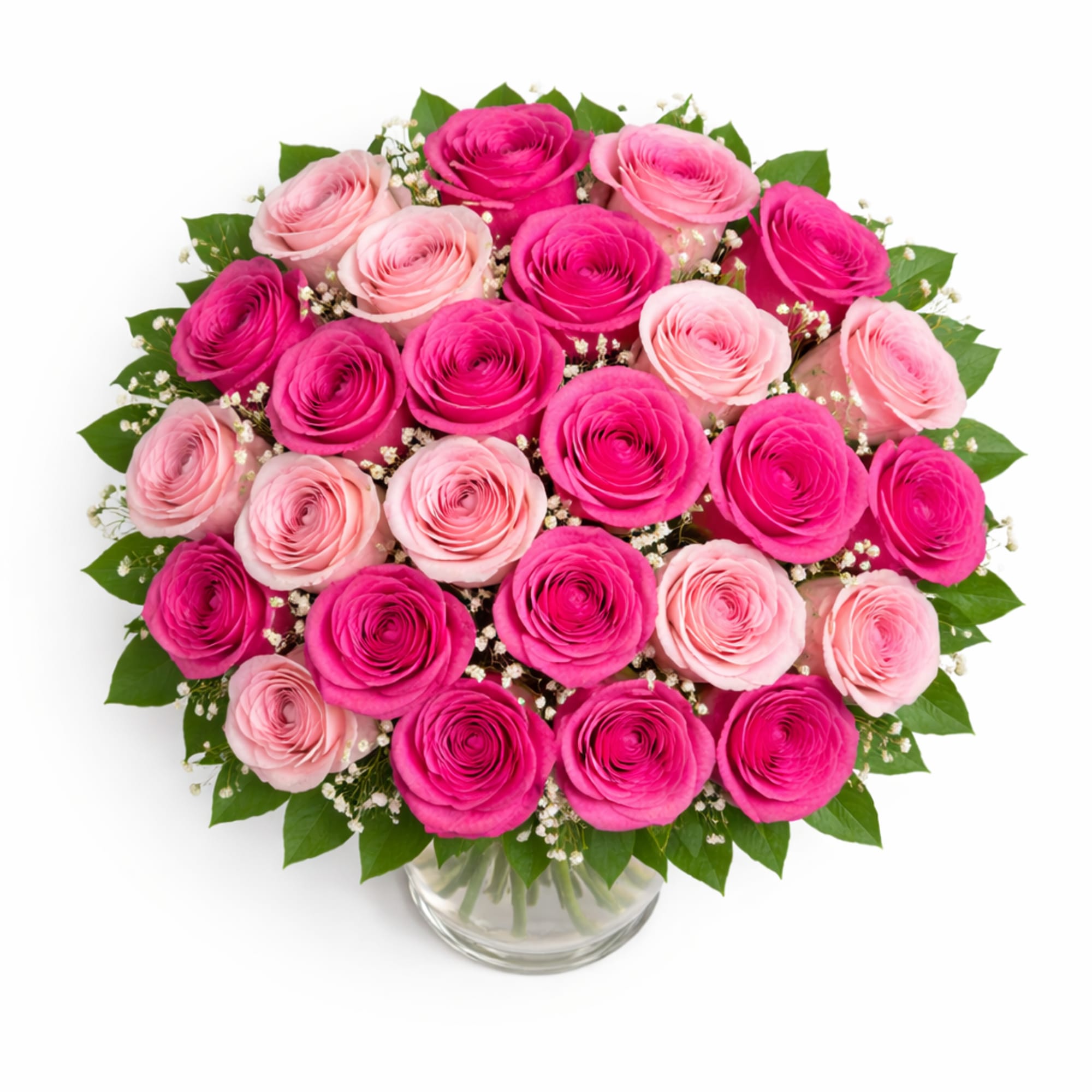 Pink and hot pink roses arranged in a clear glass vase
