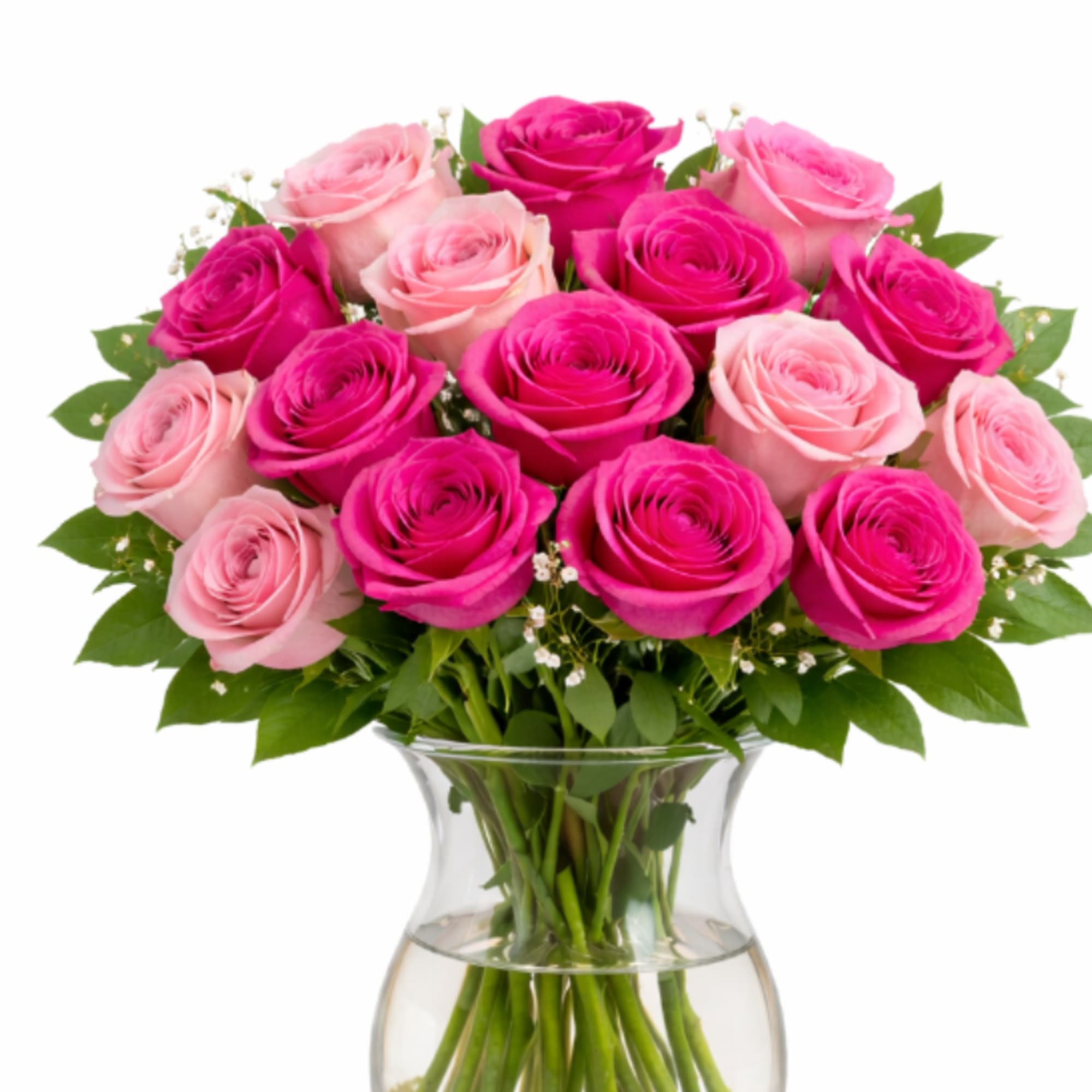 Pink and hot pink roses arranged in a clear glass vase