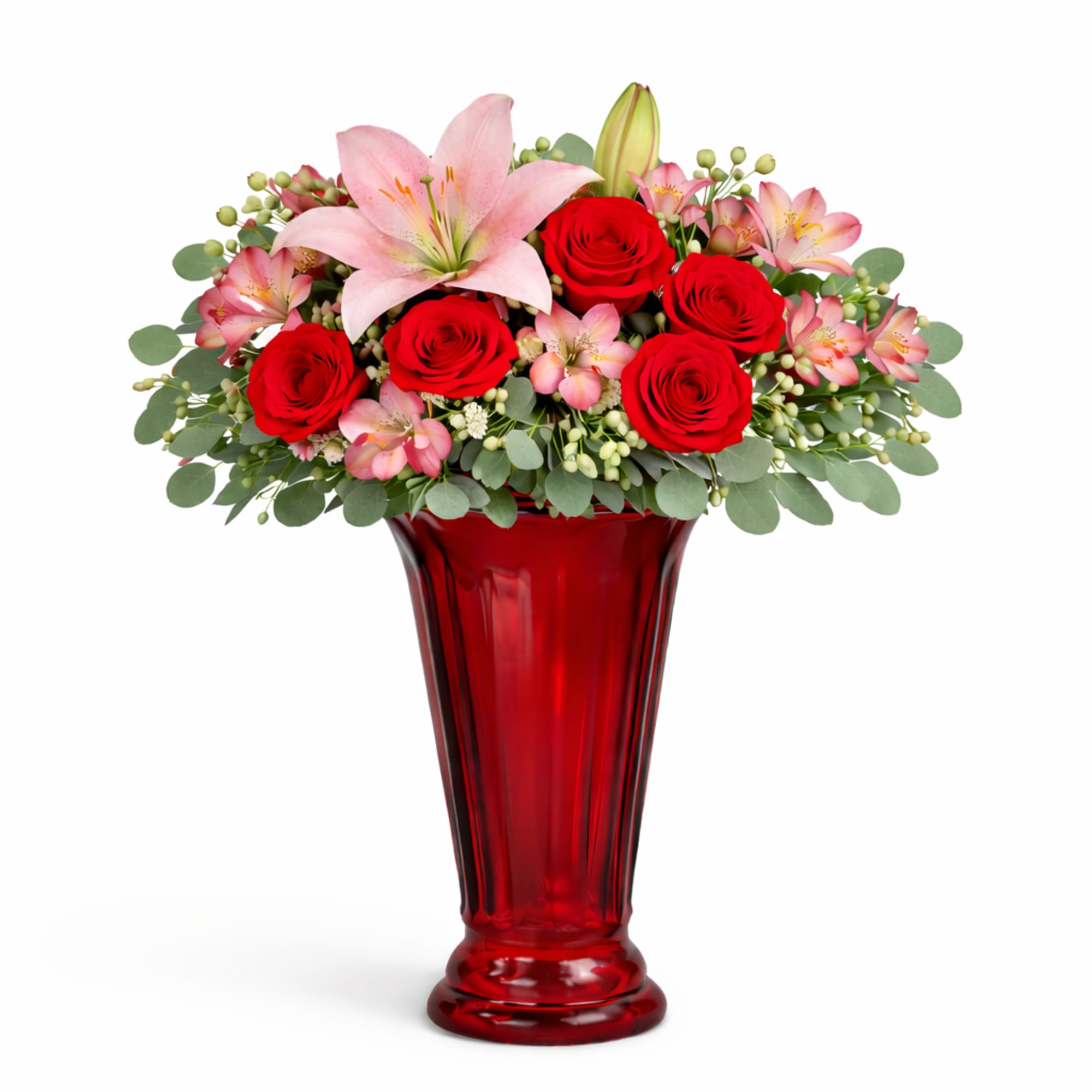 Red roses and pink lilies arranged in a tall red vase