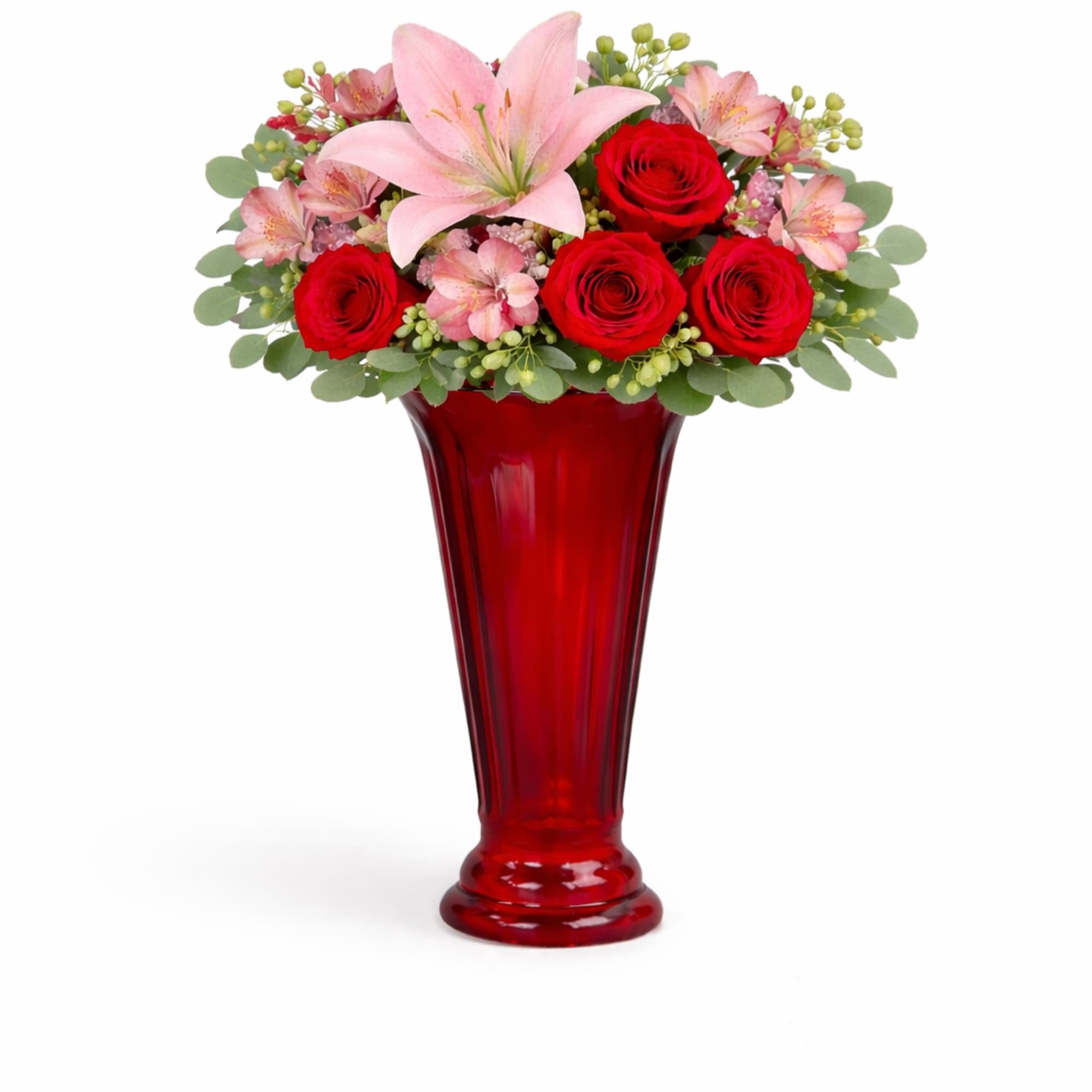 Red roses and pink lilies arranged in a tall red vase