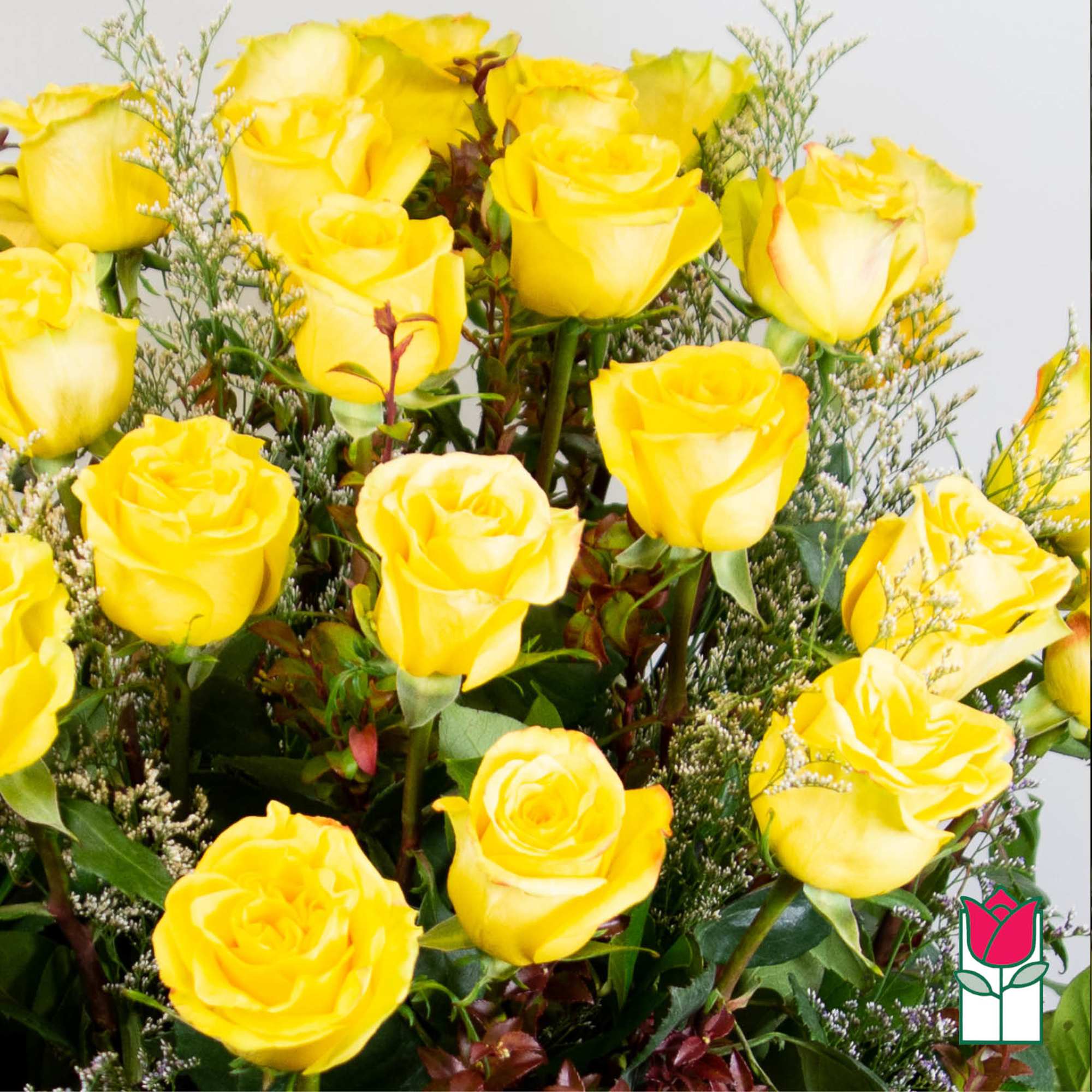 Bouquet of yellow roses with small filler flowers