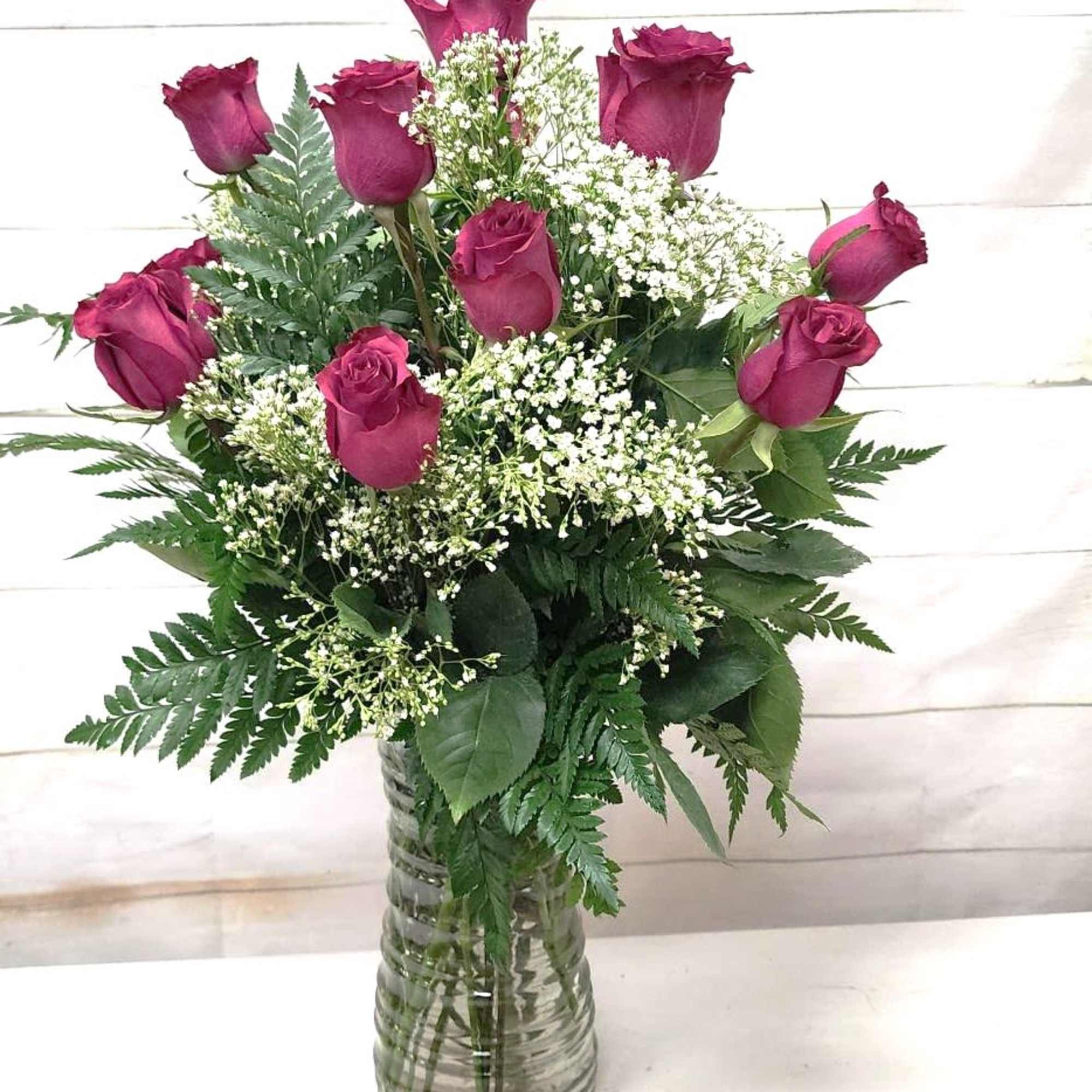 Experience the elegance and beauty of the New Berry Rose Dozen Masterpiece.