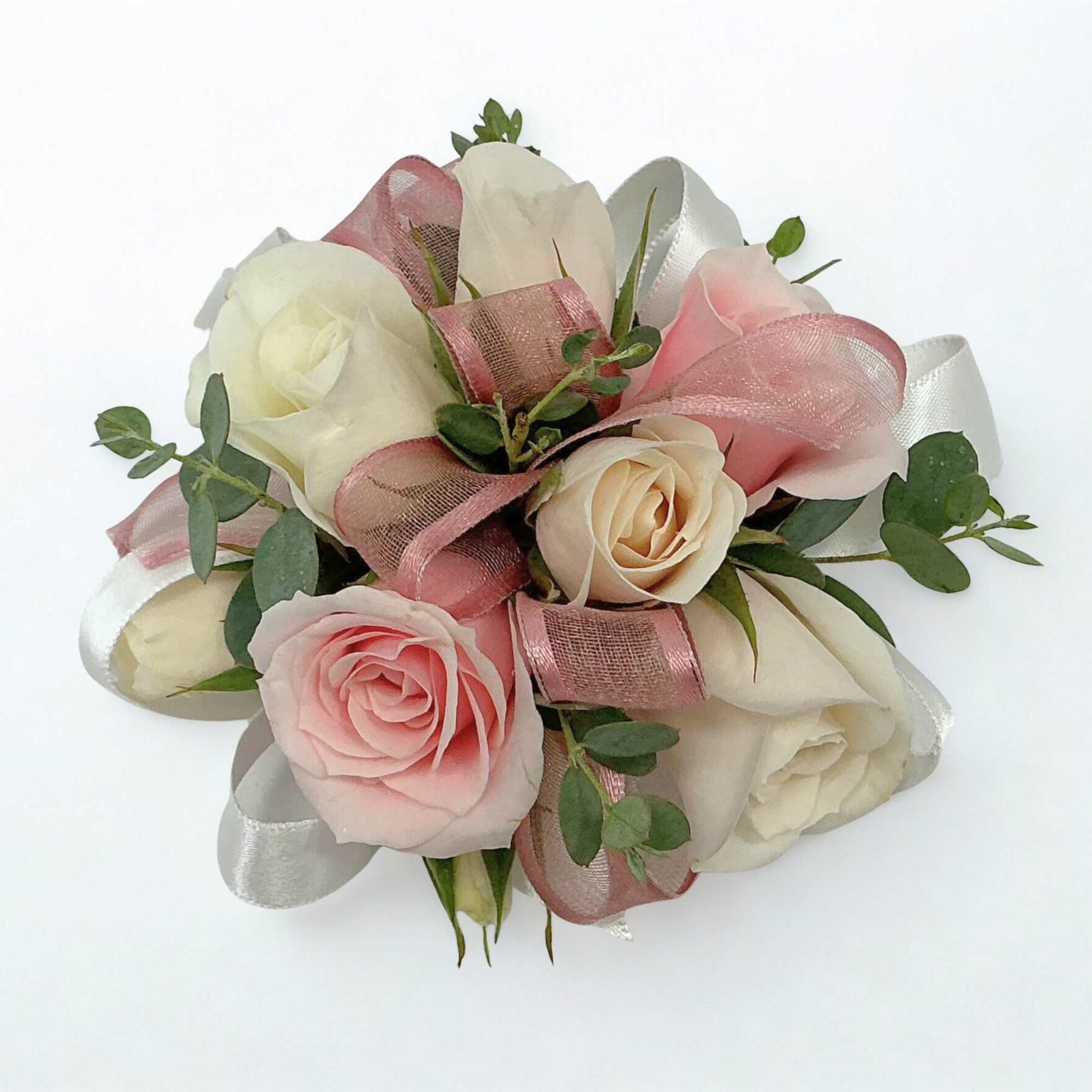 Pink and white rose bouquet with ribbon accents