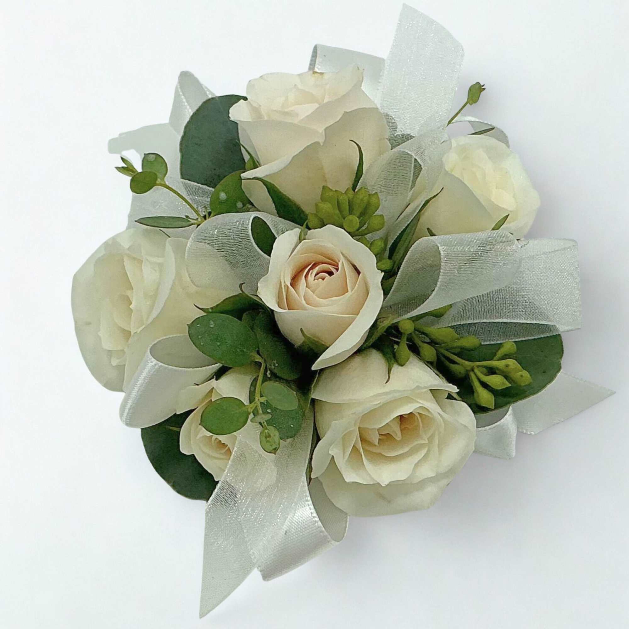 White rose bouquet with silver ribbon and greenery