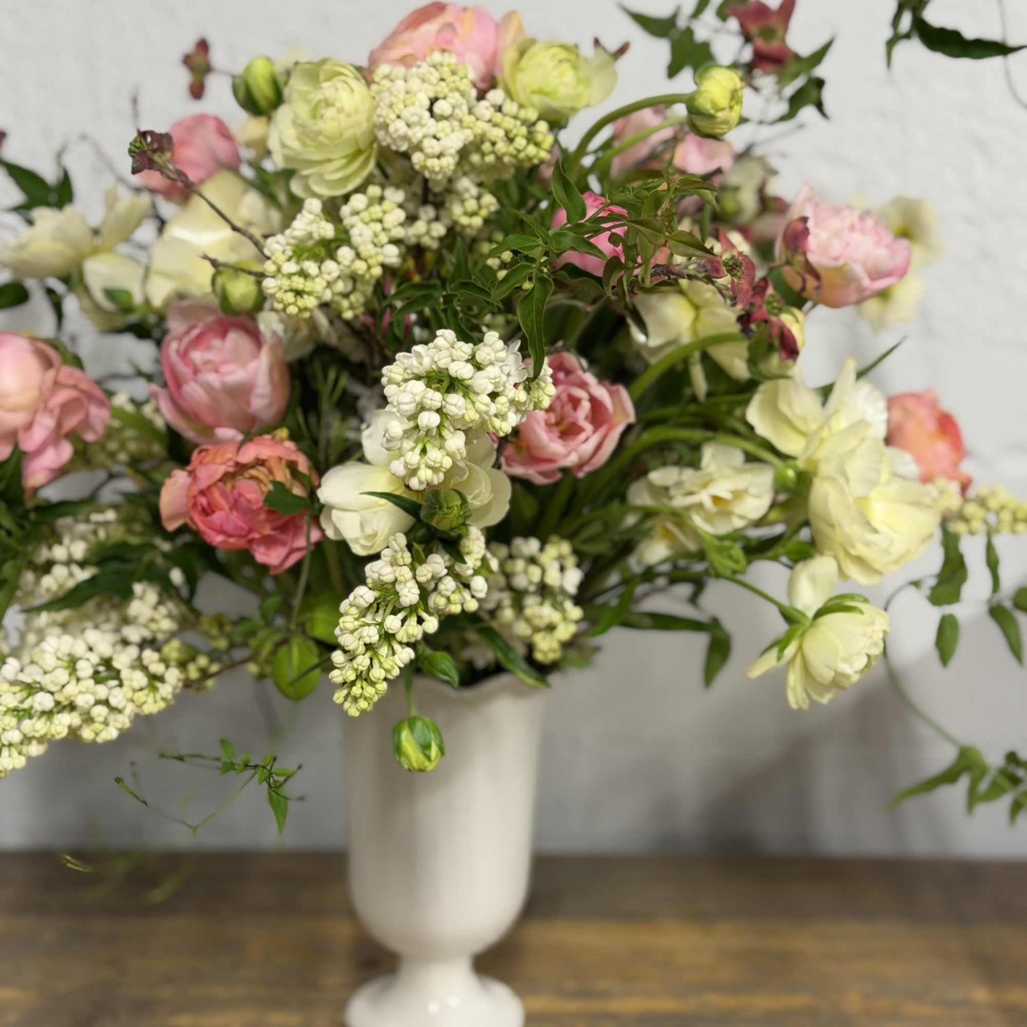 This beautiful arrangements is filled with fresh local Oregon flowers.  Lilac