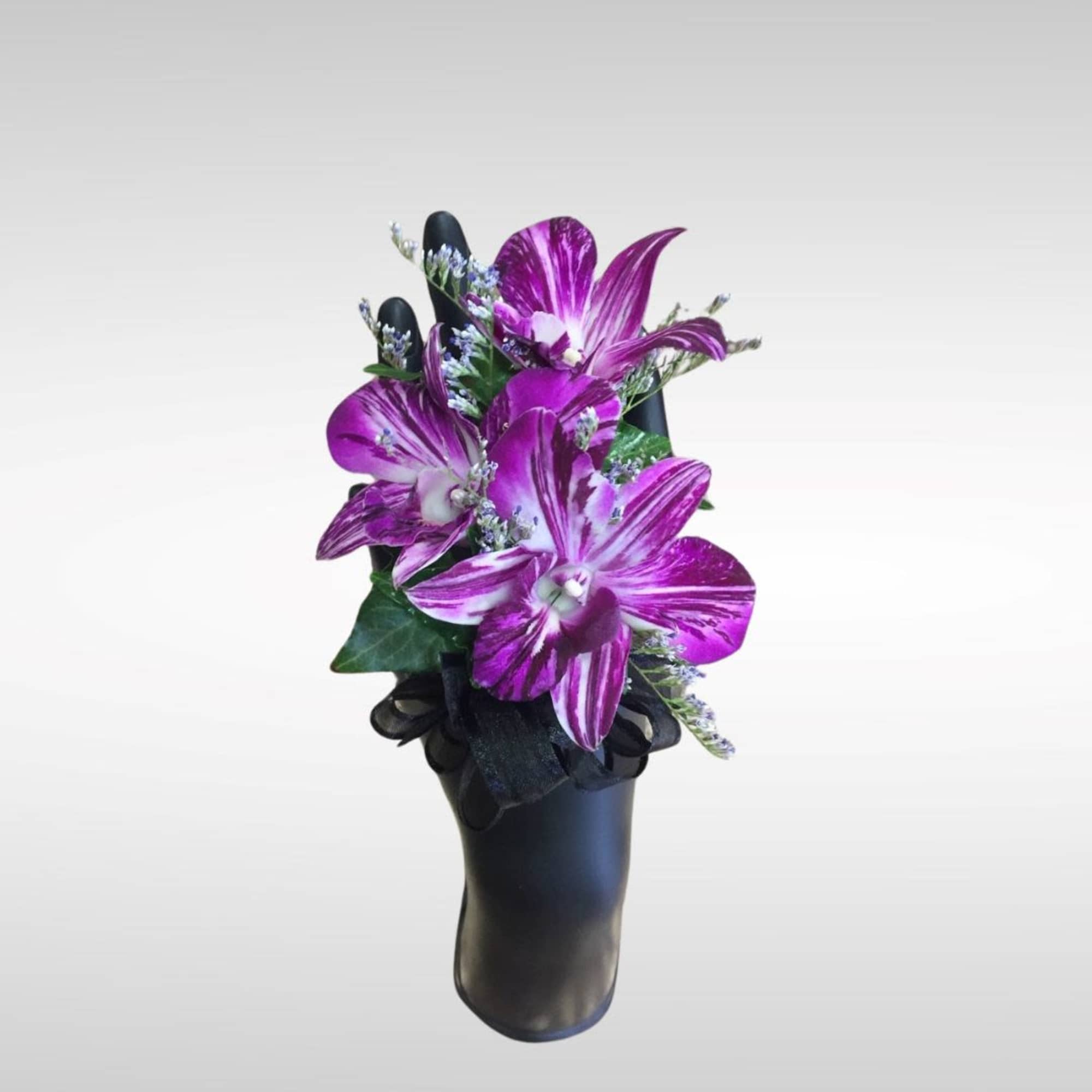 Recipe: Dendrobium Orchid corsage and/or boutonniere. 
Dendrobium orchid colors available: white or