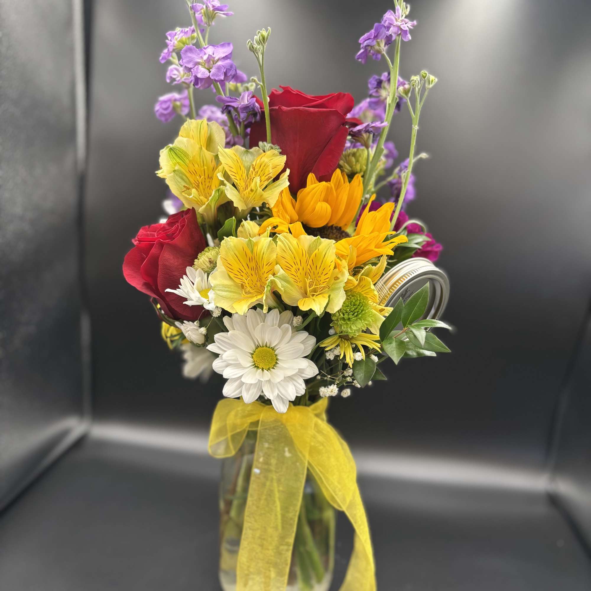 Fresh flower in mason jar 