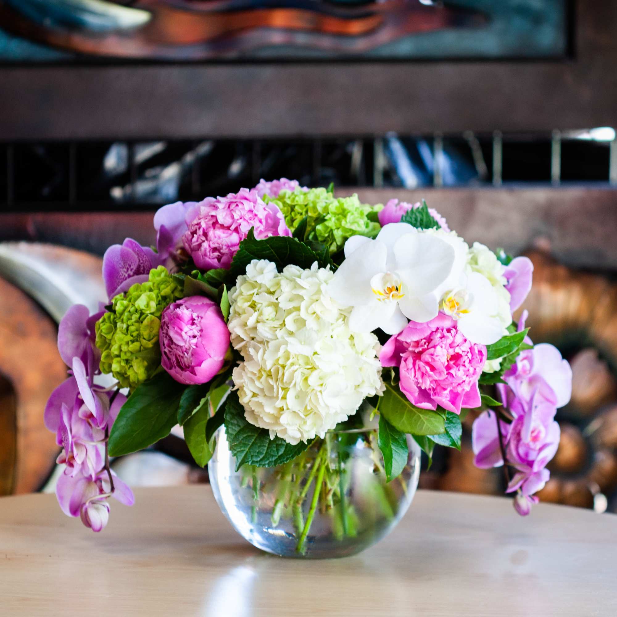 This arrangement is filled with the finest high-end spring blooms. The branches