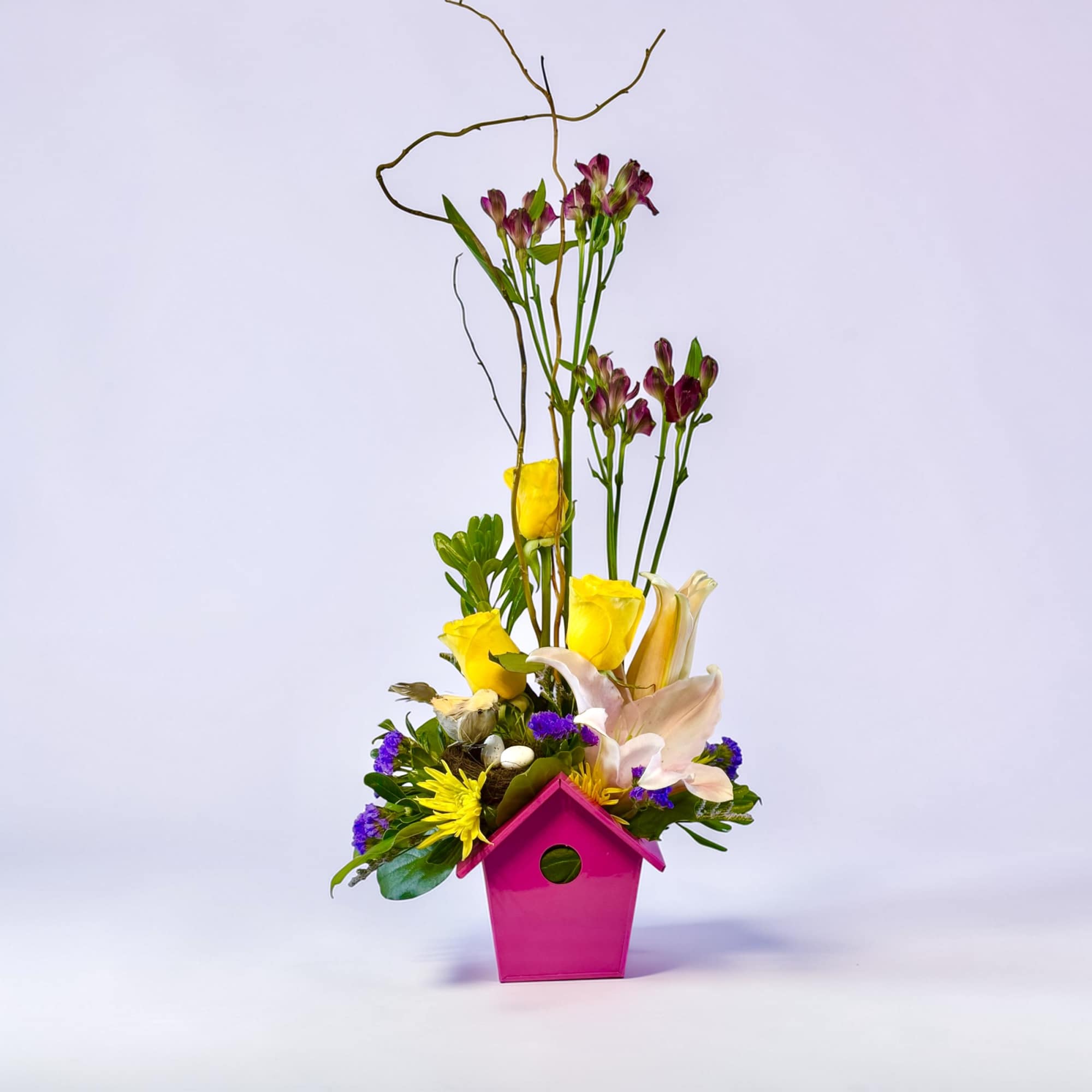 Petal Perfection&rsquo;s Spring Birdhouse. Spring birdhouse arrangement with pastel blooms and charming