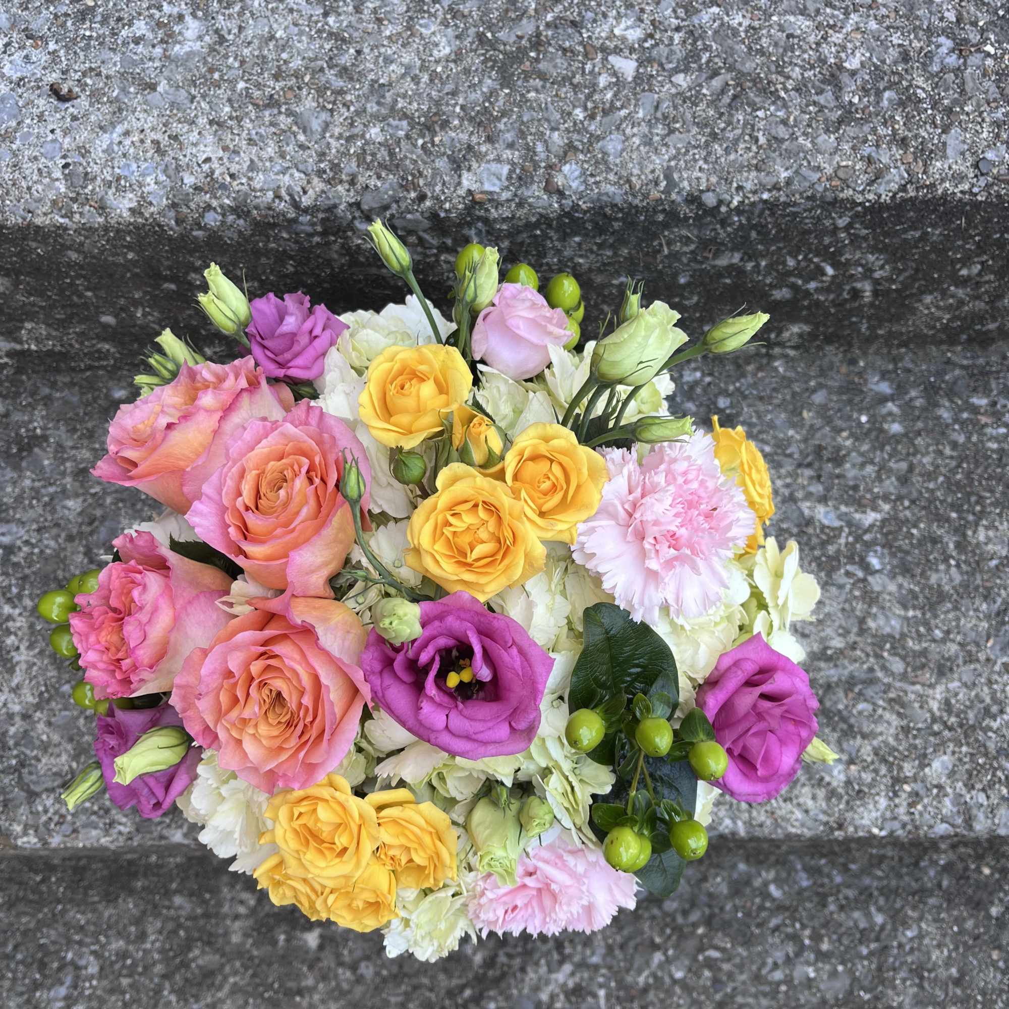 This arrangement is in a 8 inch bubble bowl filled with hydrangeas