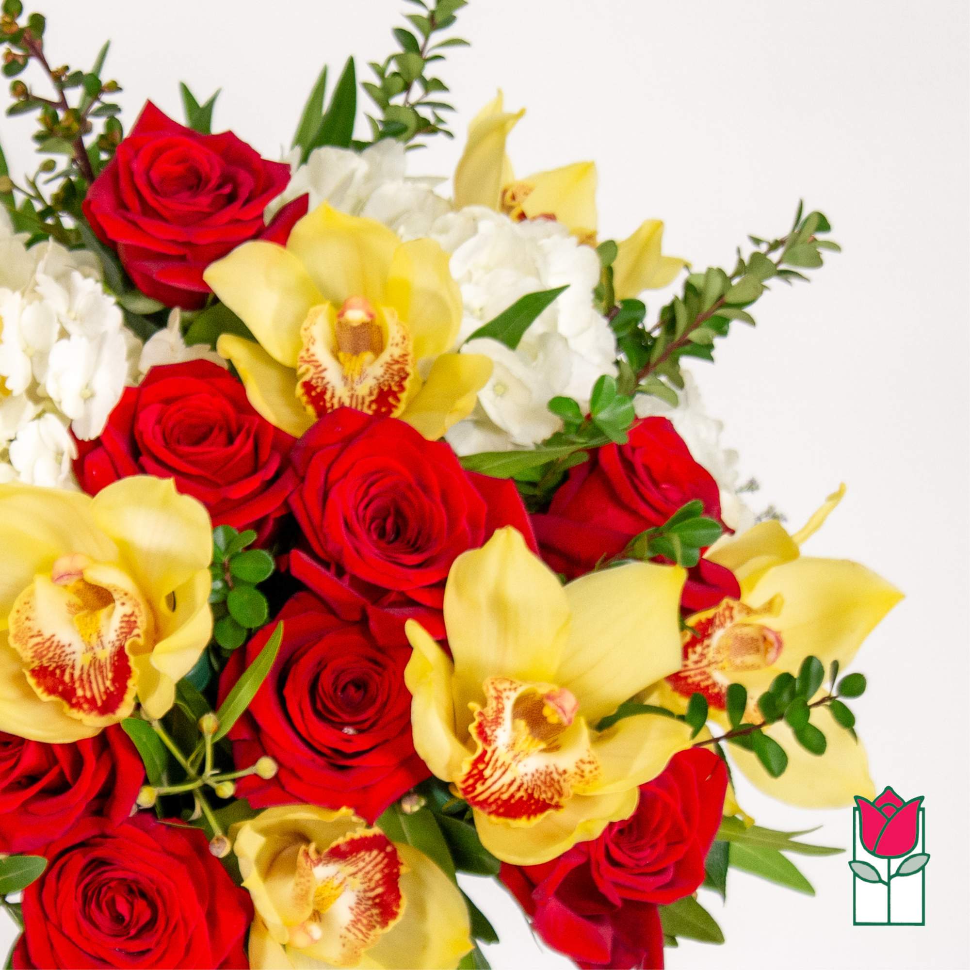 Bouquet of red roses and yellow orchids with white flowers