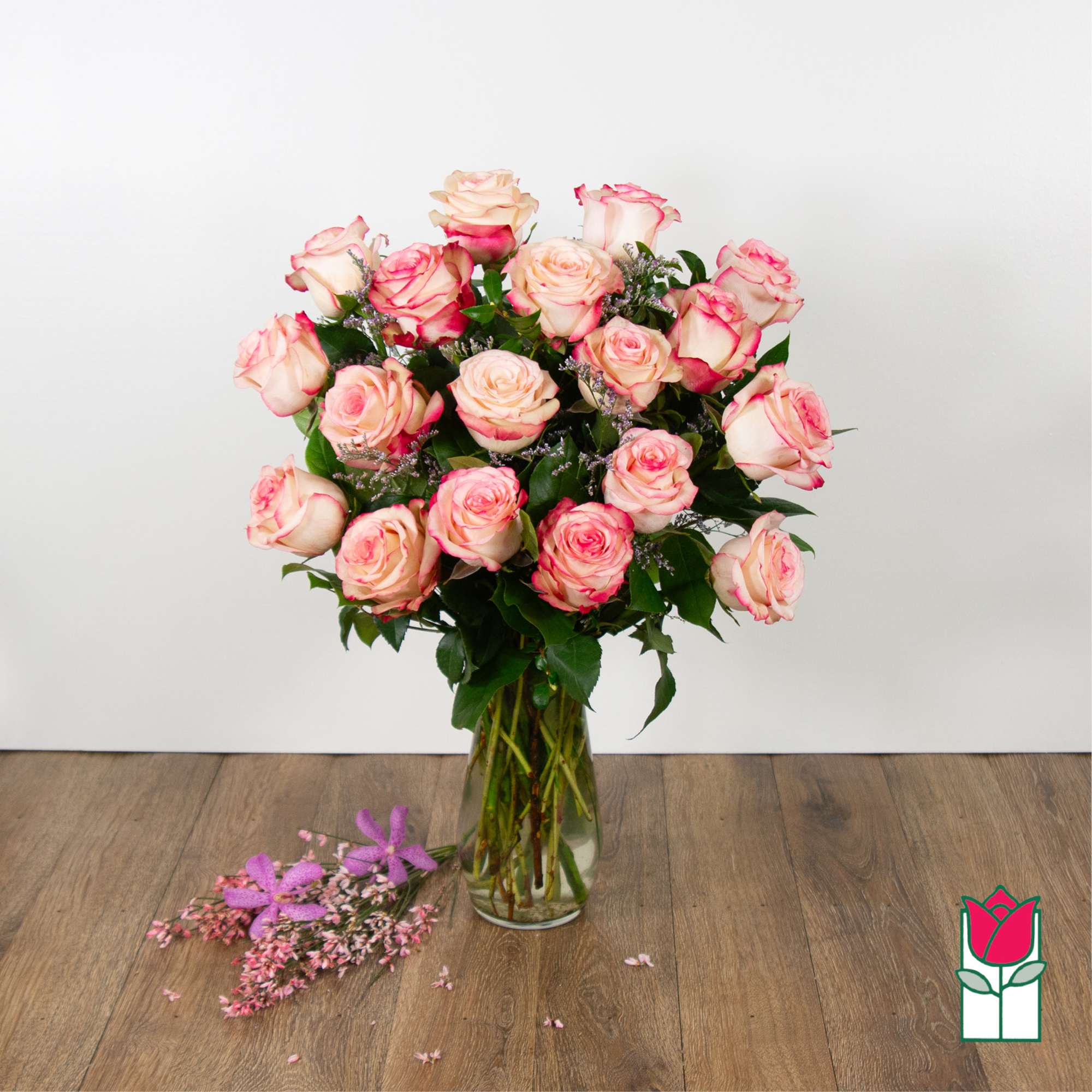 Indulge in the timeless elegance of our Medium Stem Rose Arrangement, meticulously