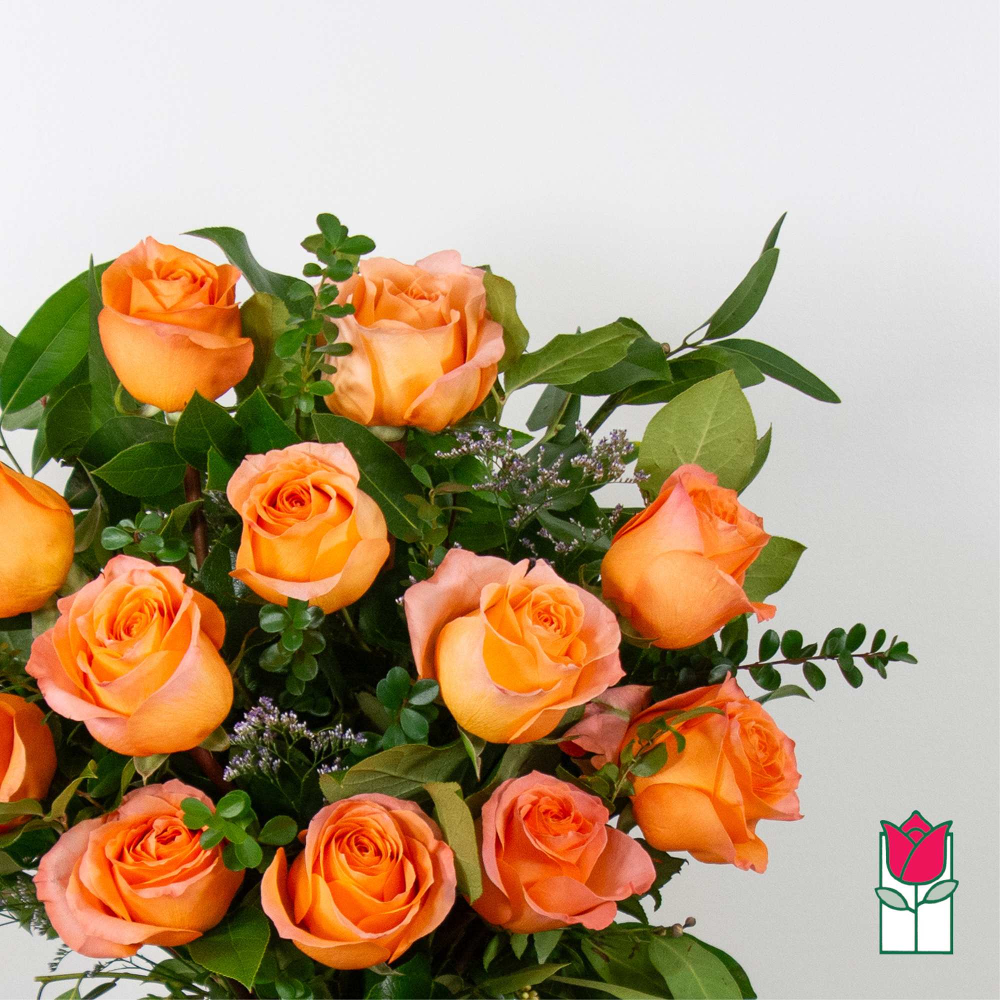 Bouquet of orange roses with greenery