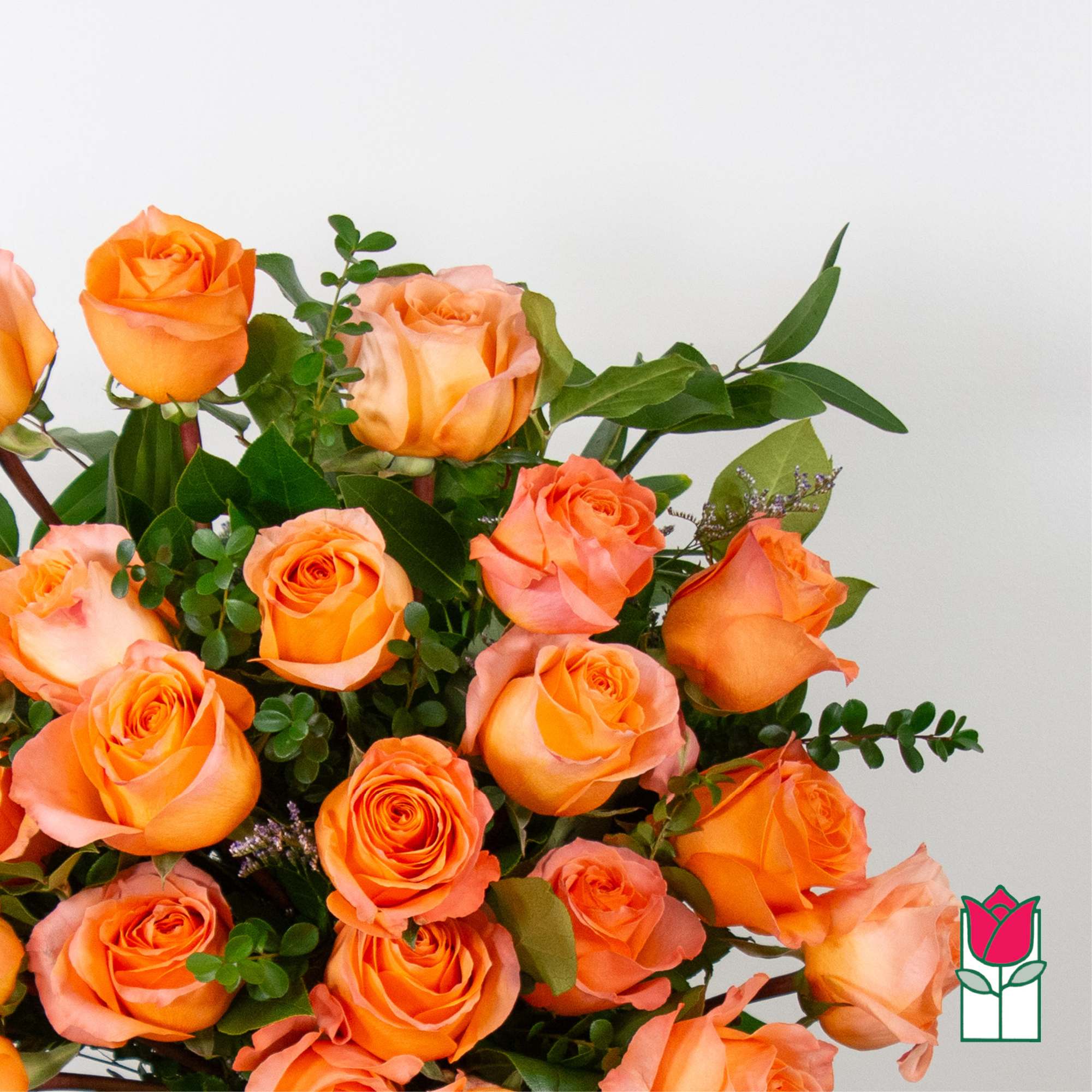 Bouquet of orange roses with green foliage