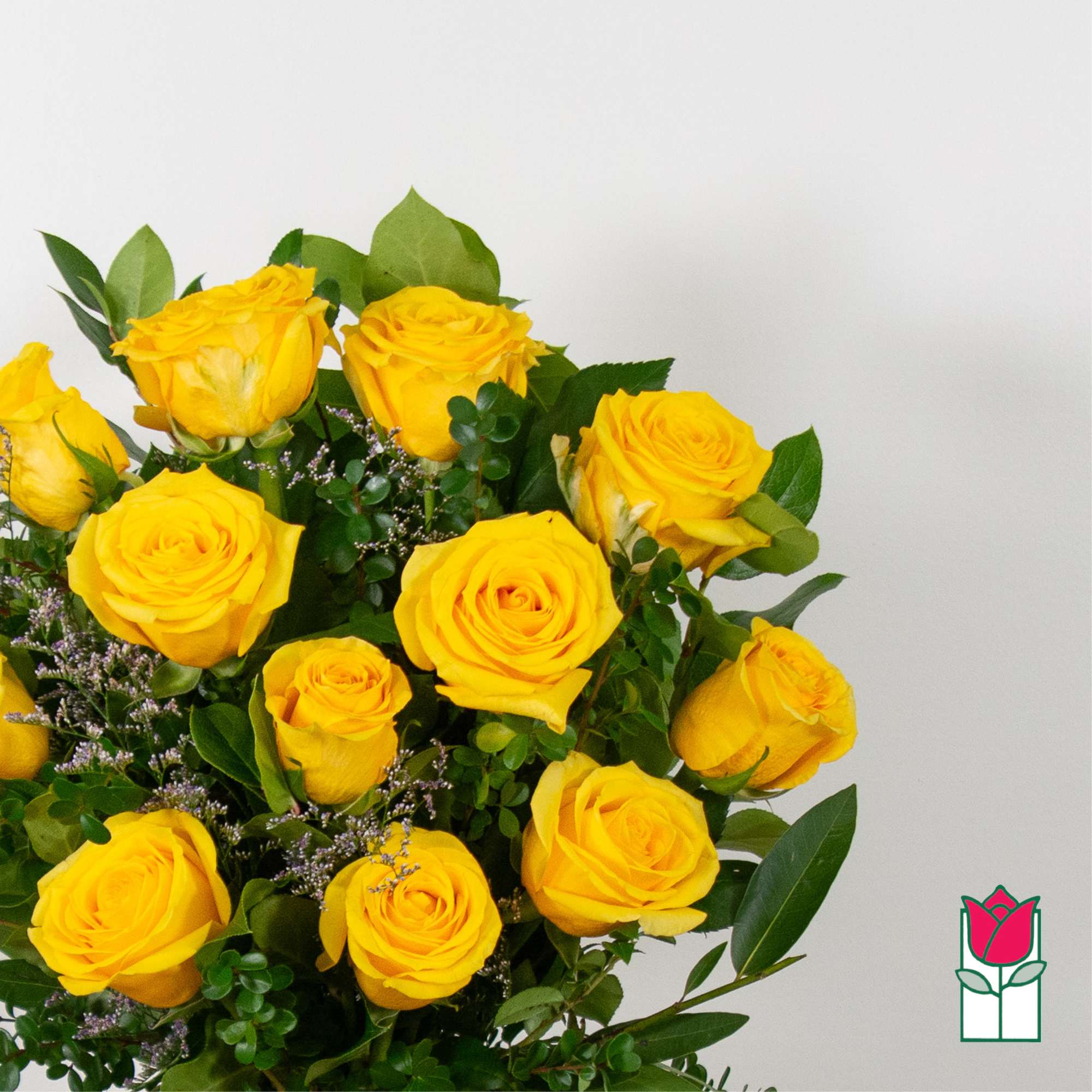 Bouquet of yellow roses with greenery