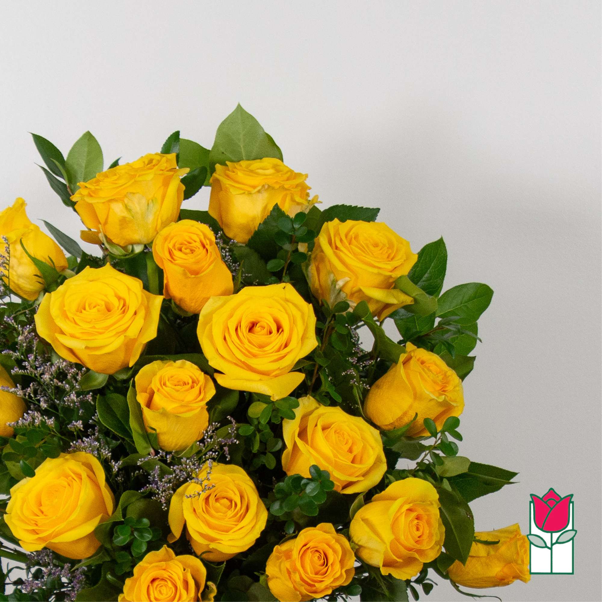 Bouquet of yellow roses with green foliage