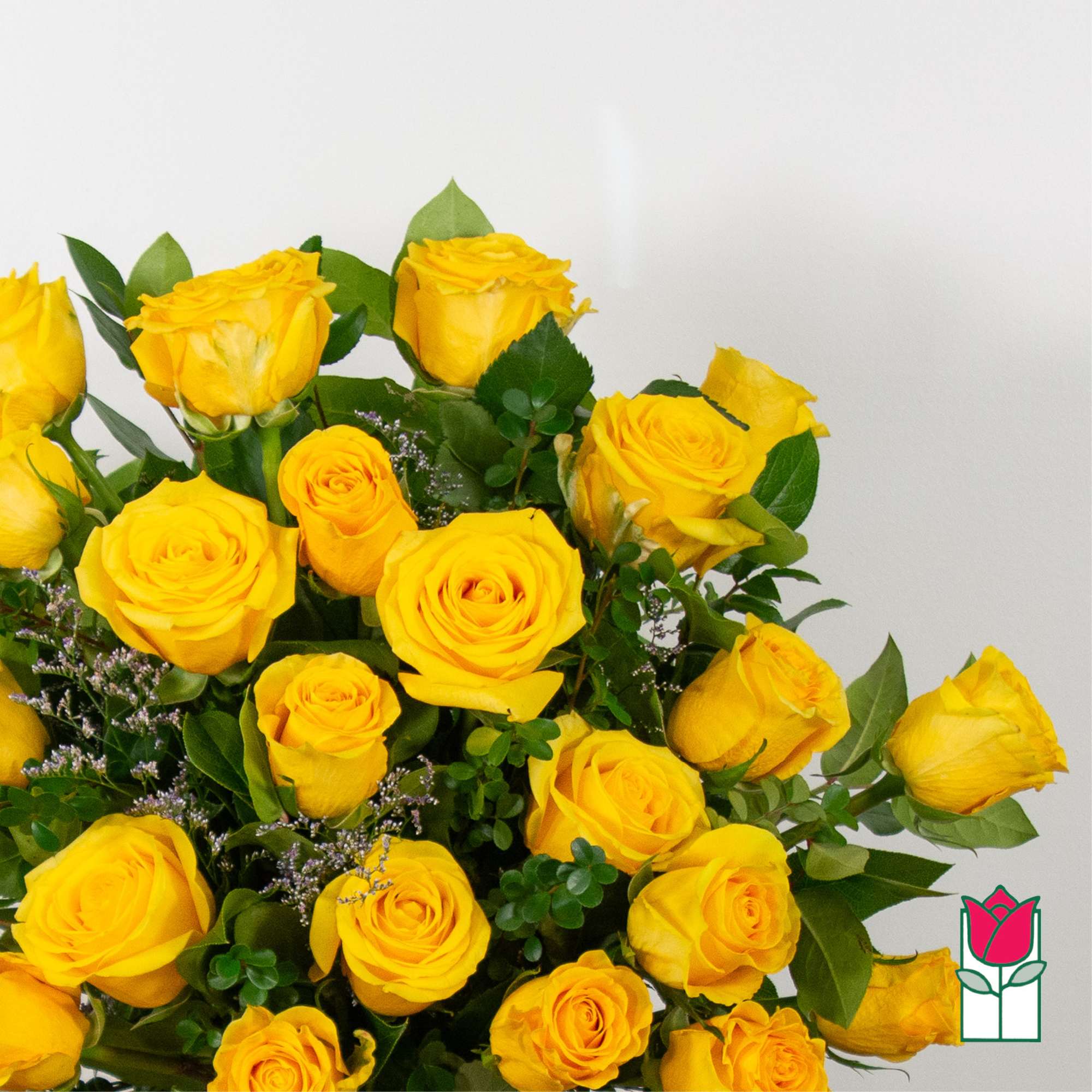 Bouquet of yellow roses with greenery