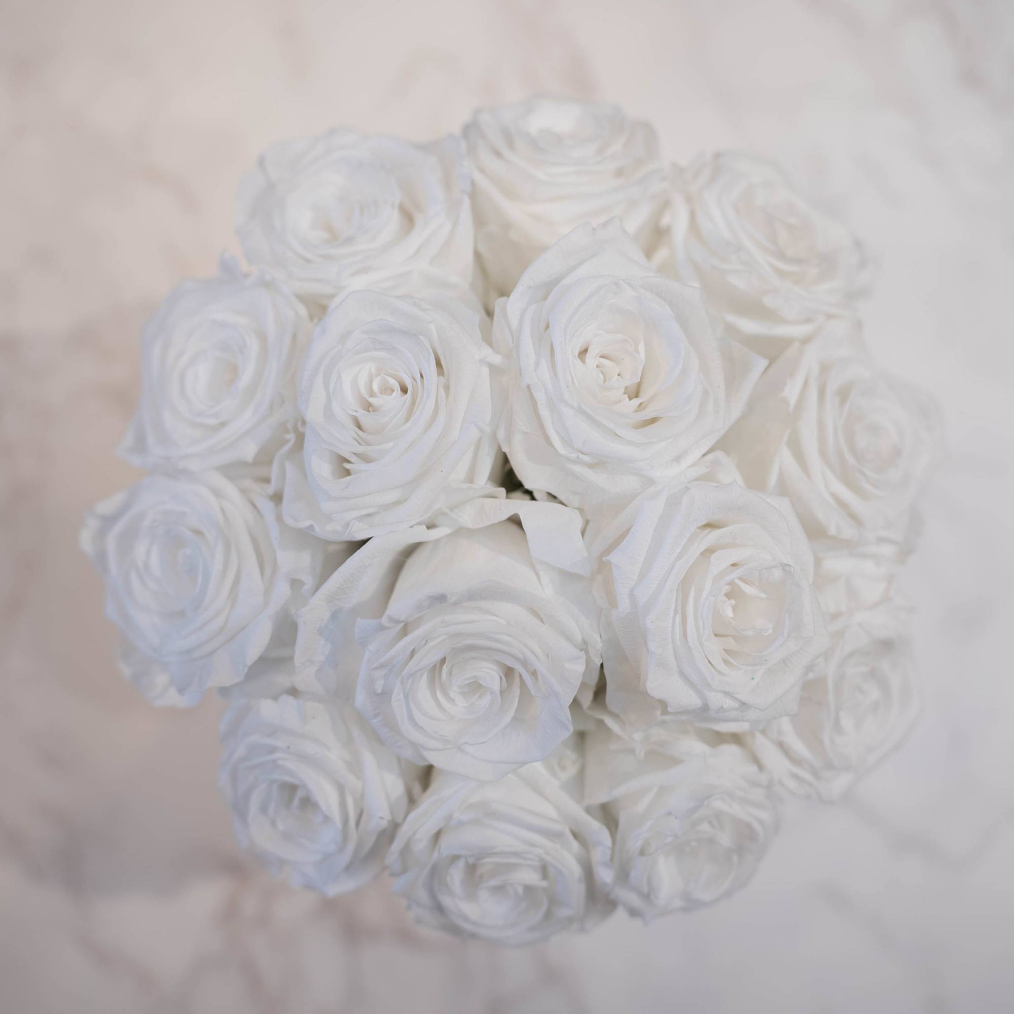 High end preserved roses, custom designed by hand in our local shop