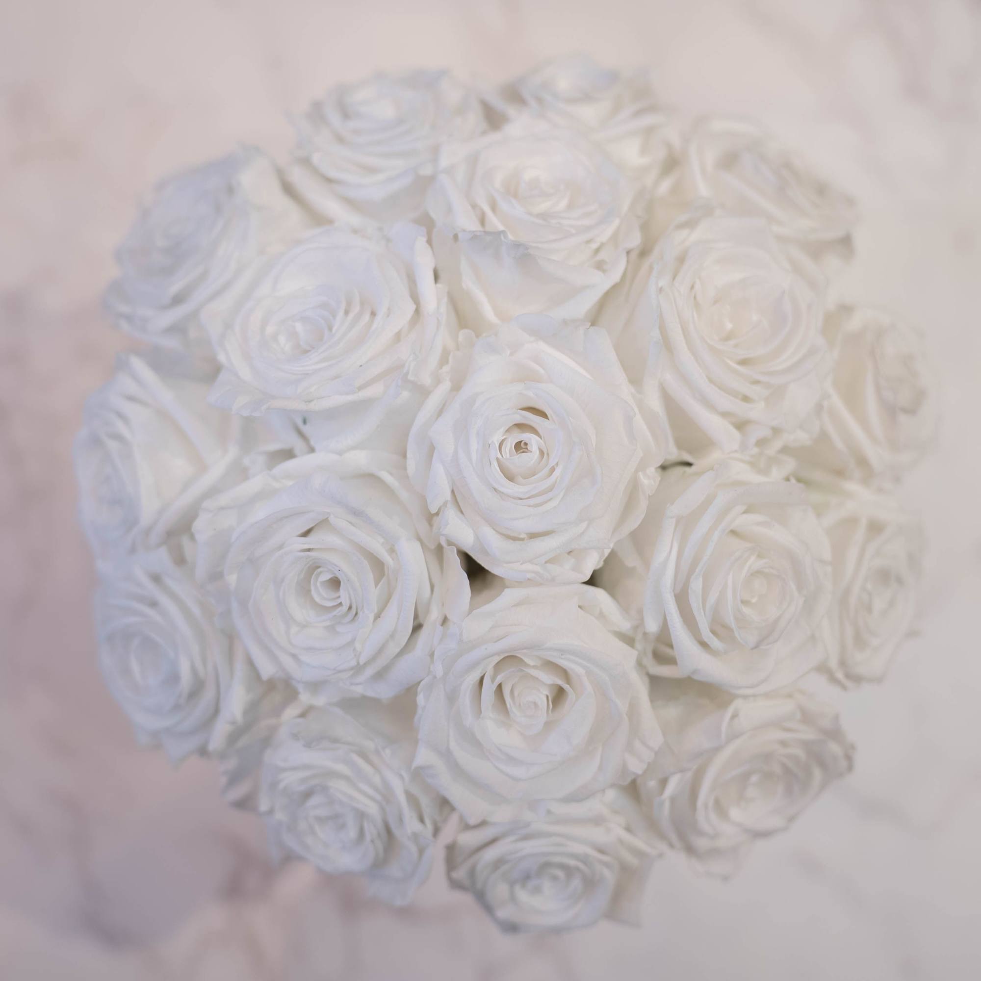 High end preserved roses, custom designed by hand in our local shop