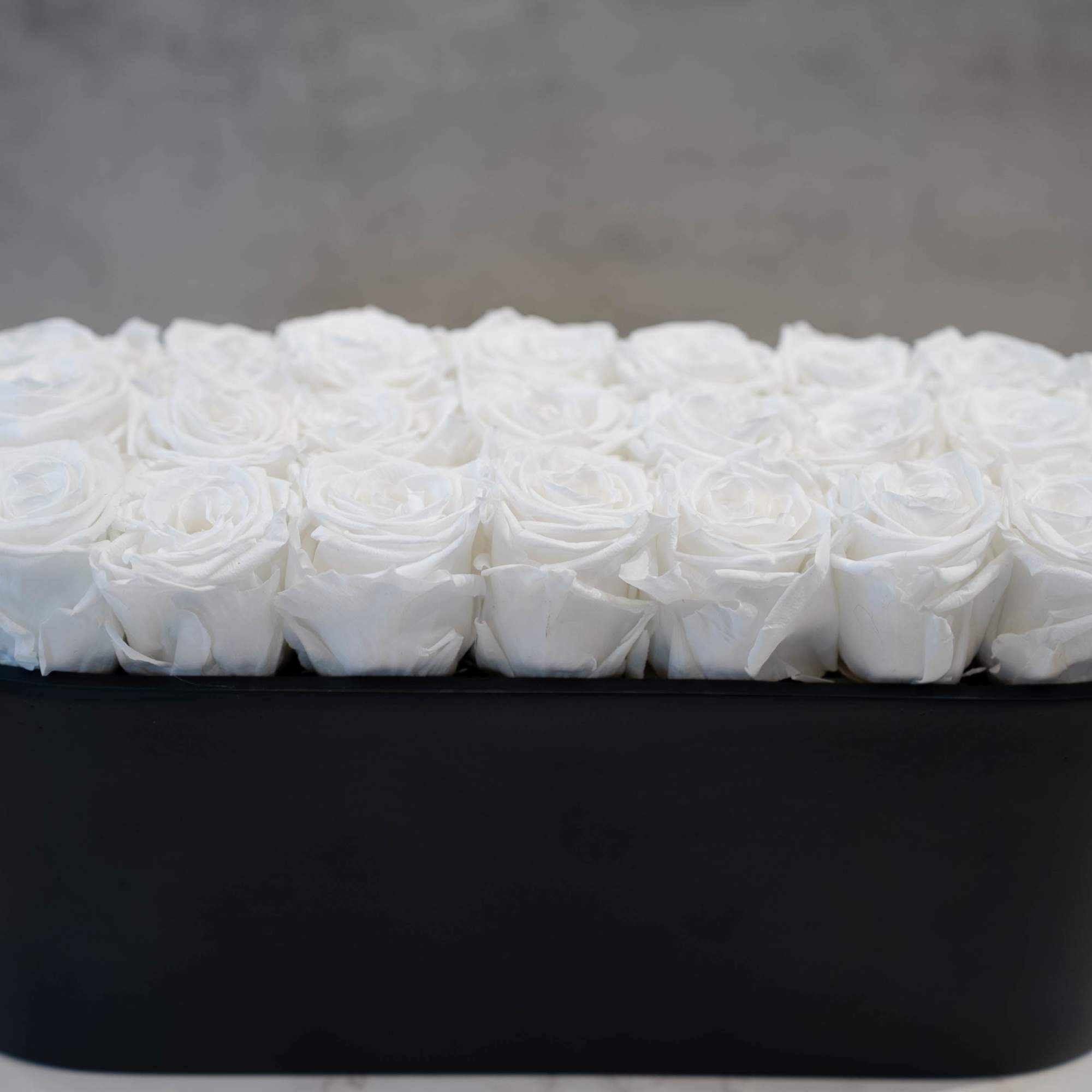 High end preserved roses, custom designed by hand in our local shop