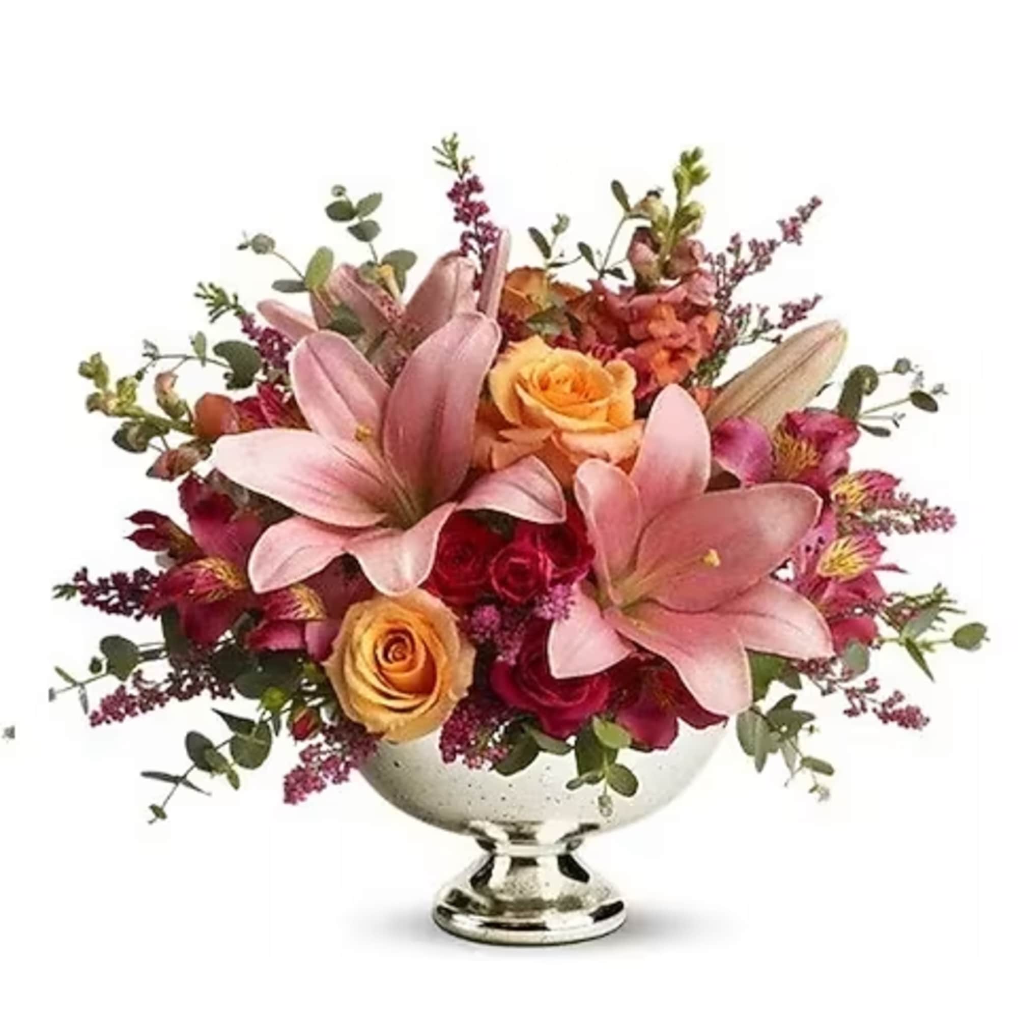 Just peachy! Pale pink and orange blooms are gathered in a classic