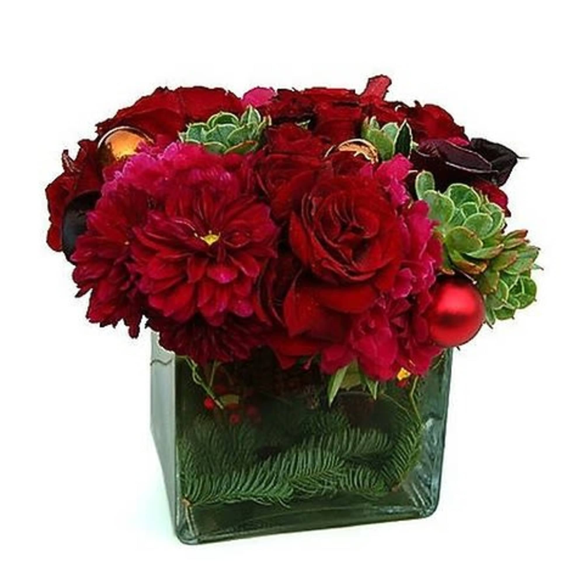 A lush mix of winter florals including roses, dahlias, tulips and echeveria
