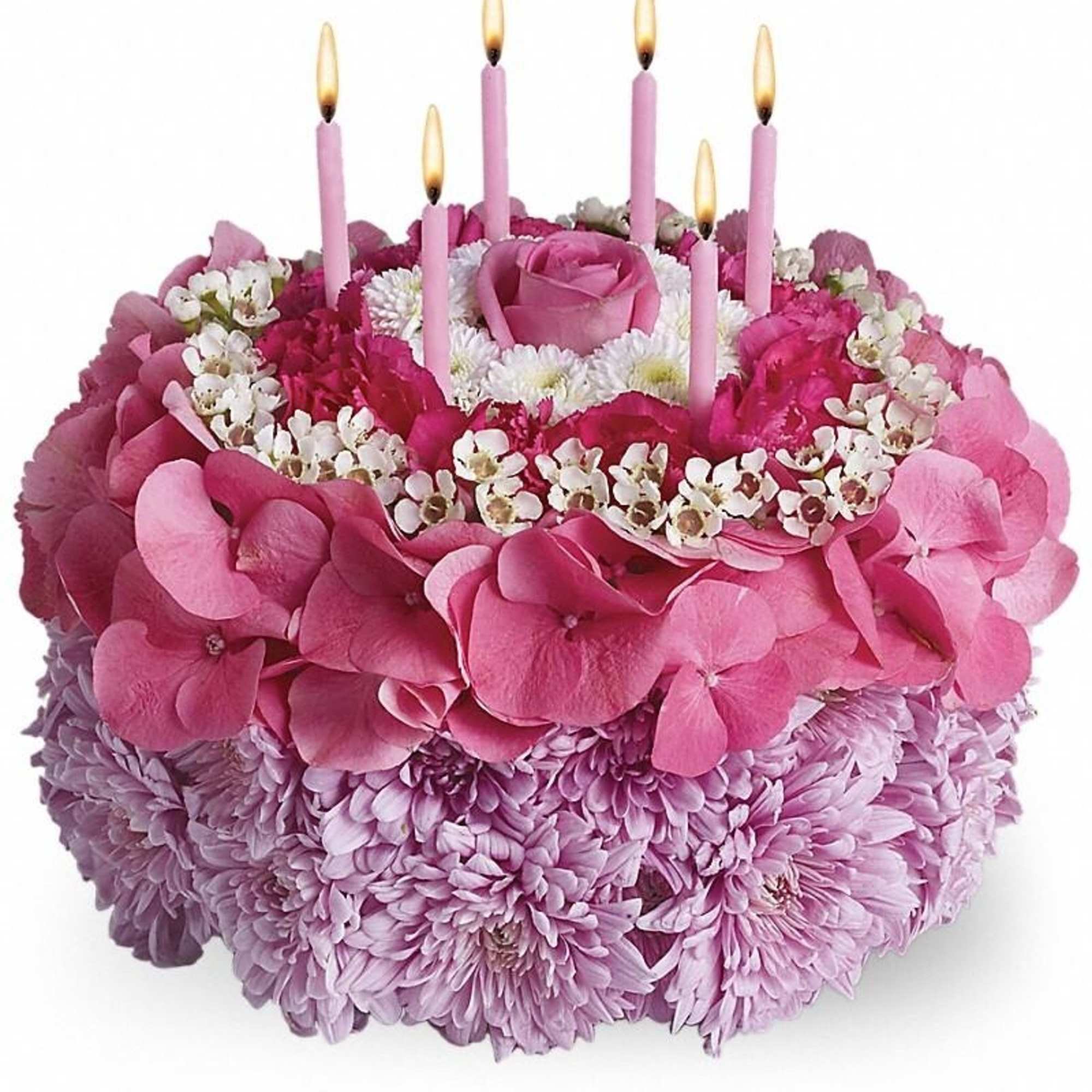 Pink floral cake arrangement with candles and a rose center