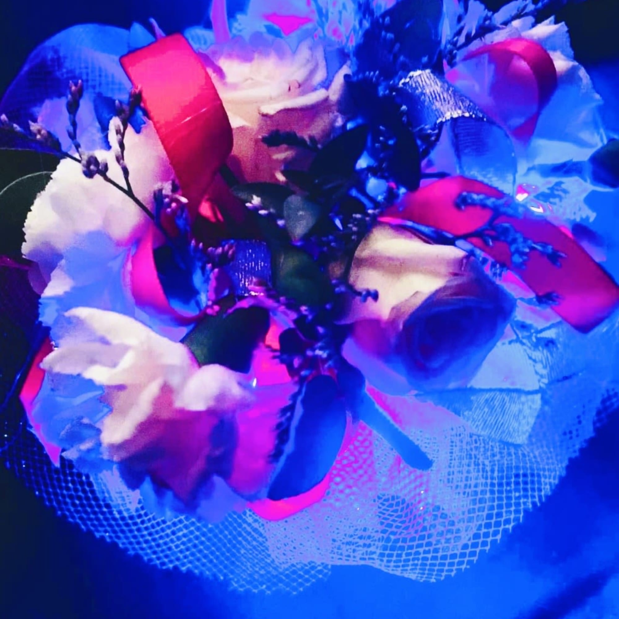A stunning light-up corsage designed to make a statement, featuring beautifully arranged