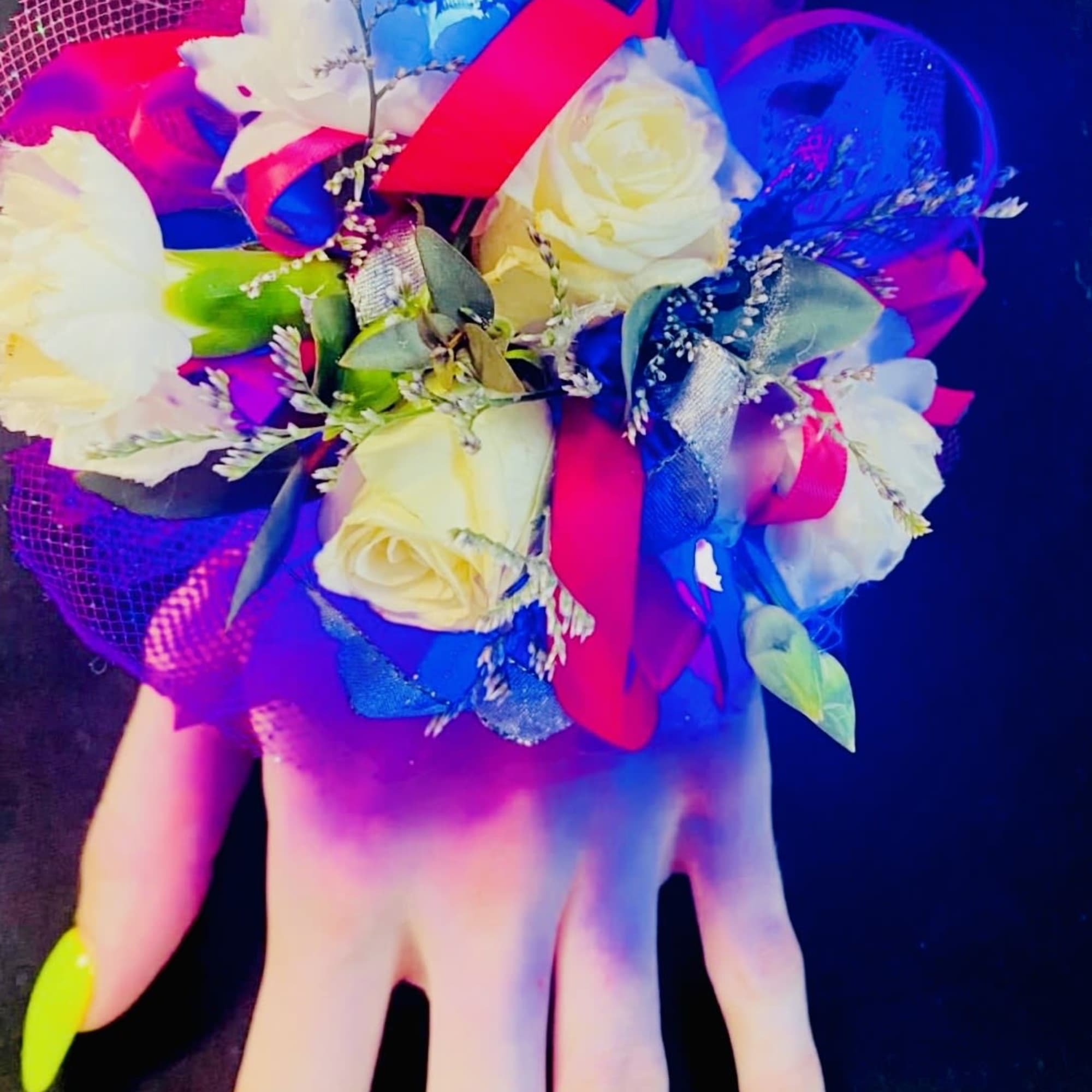 A stunning light-up corsage designed to make a statement, featuring beautifully arranged