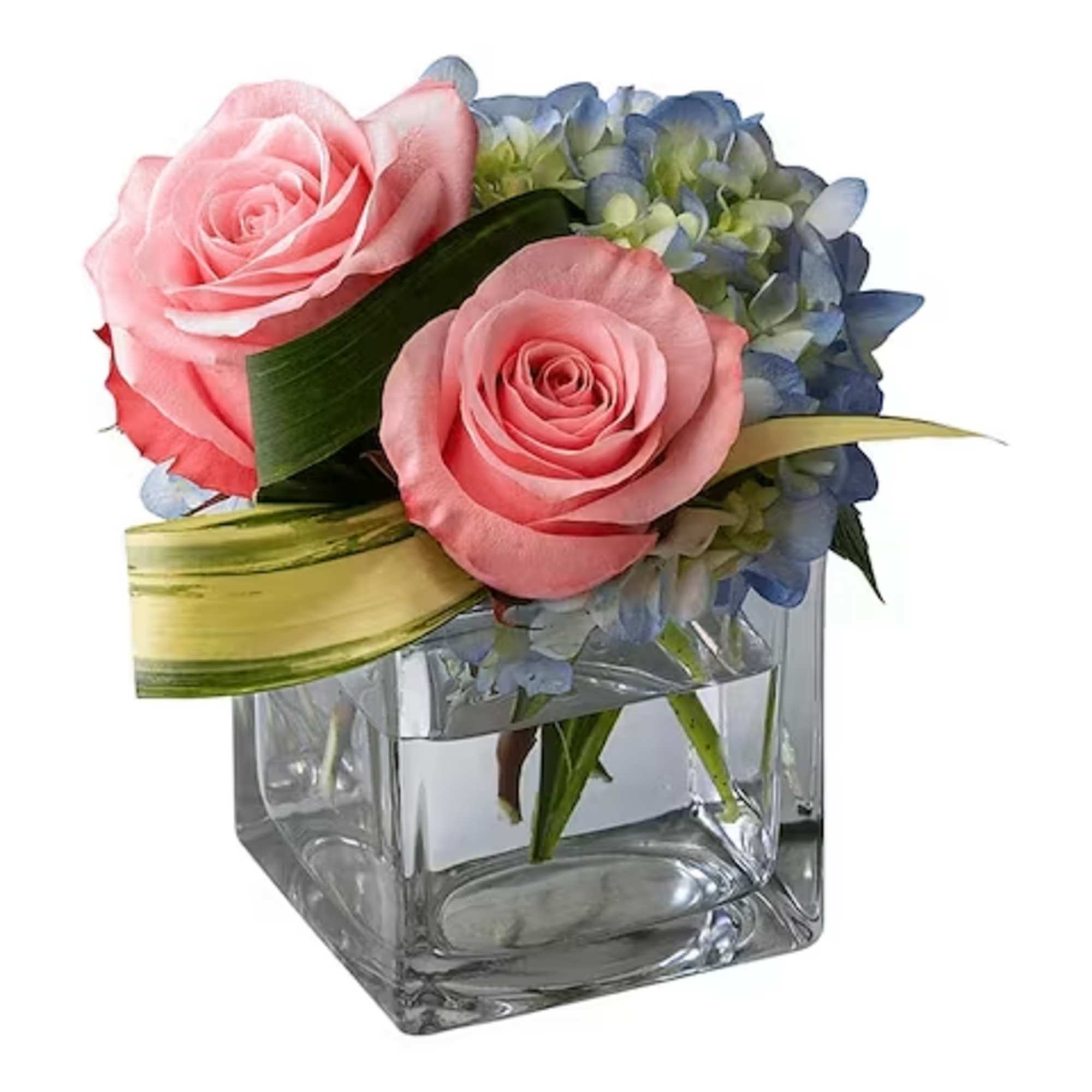 Pink roses and blue hydrangeas in a clear square vase
