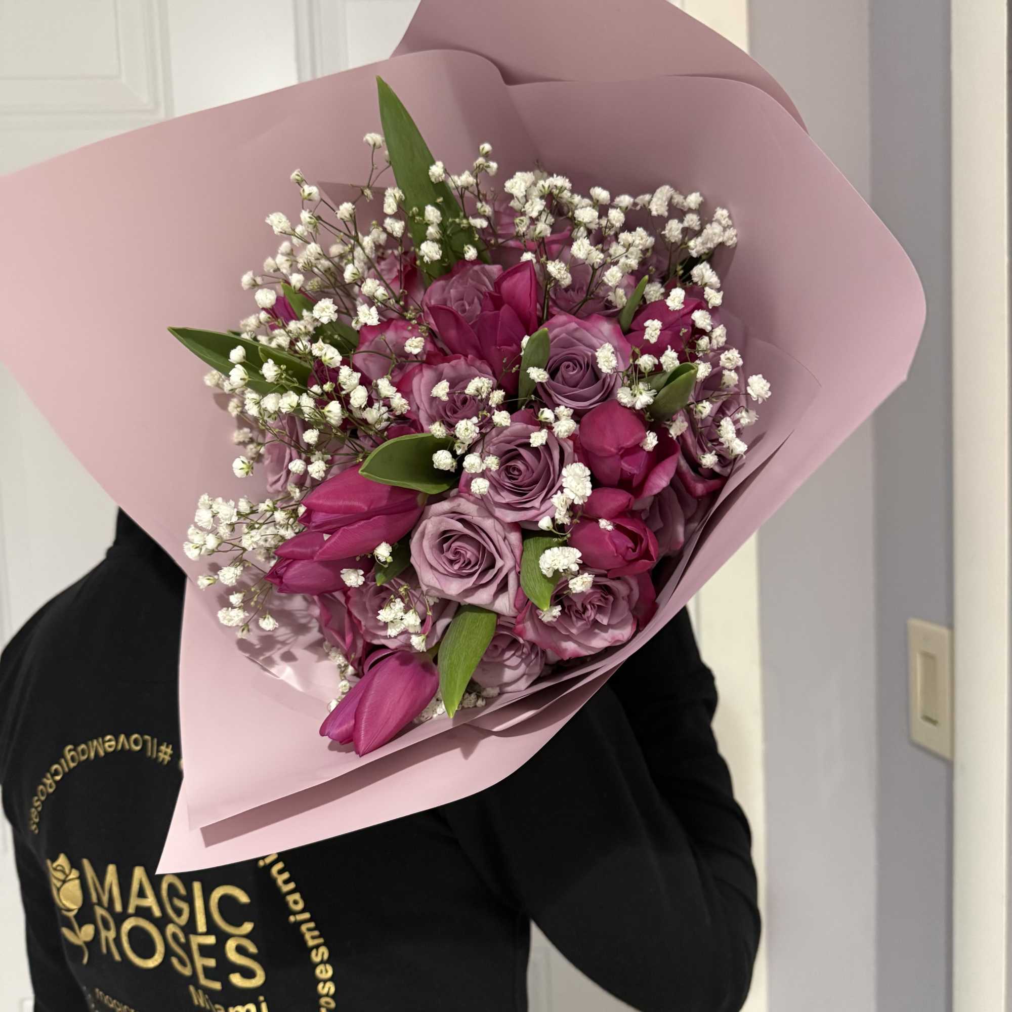 A beautiful blend of fresh roses and vibrant tulips, this bouquet captures