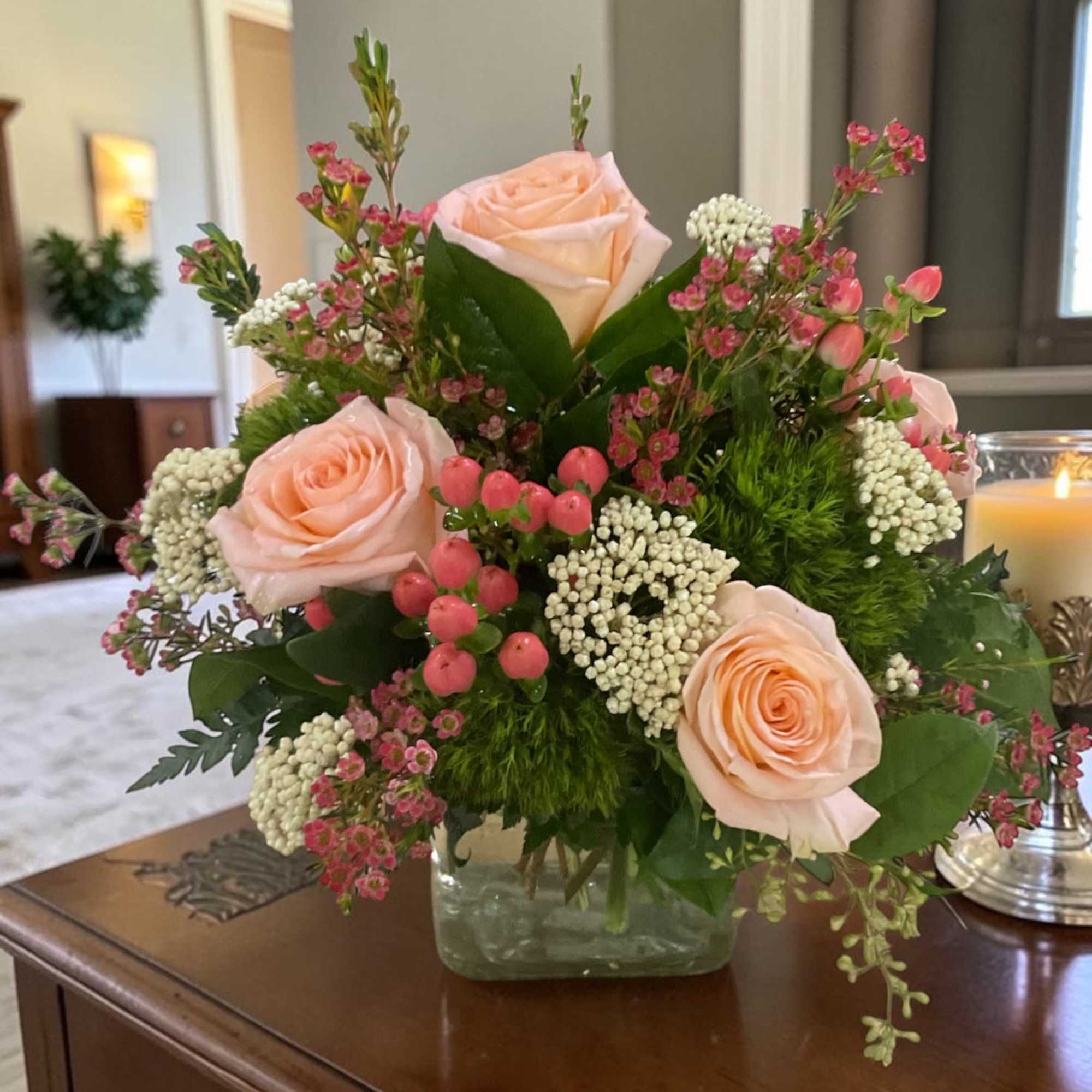 Peach Darling is a fresh, garden-style floral arrangement built around soft peach
