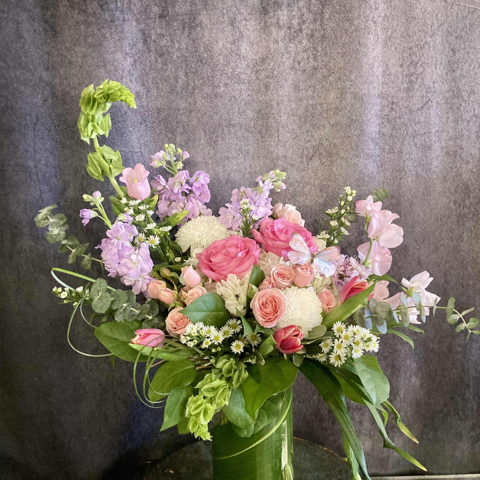 Pink and lavender mixed bouquet in a glass vase