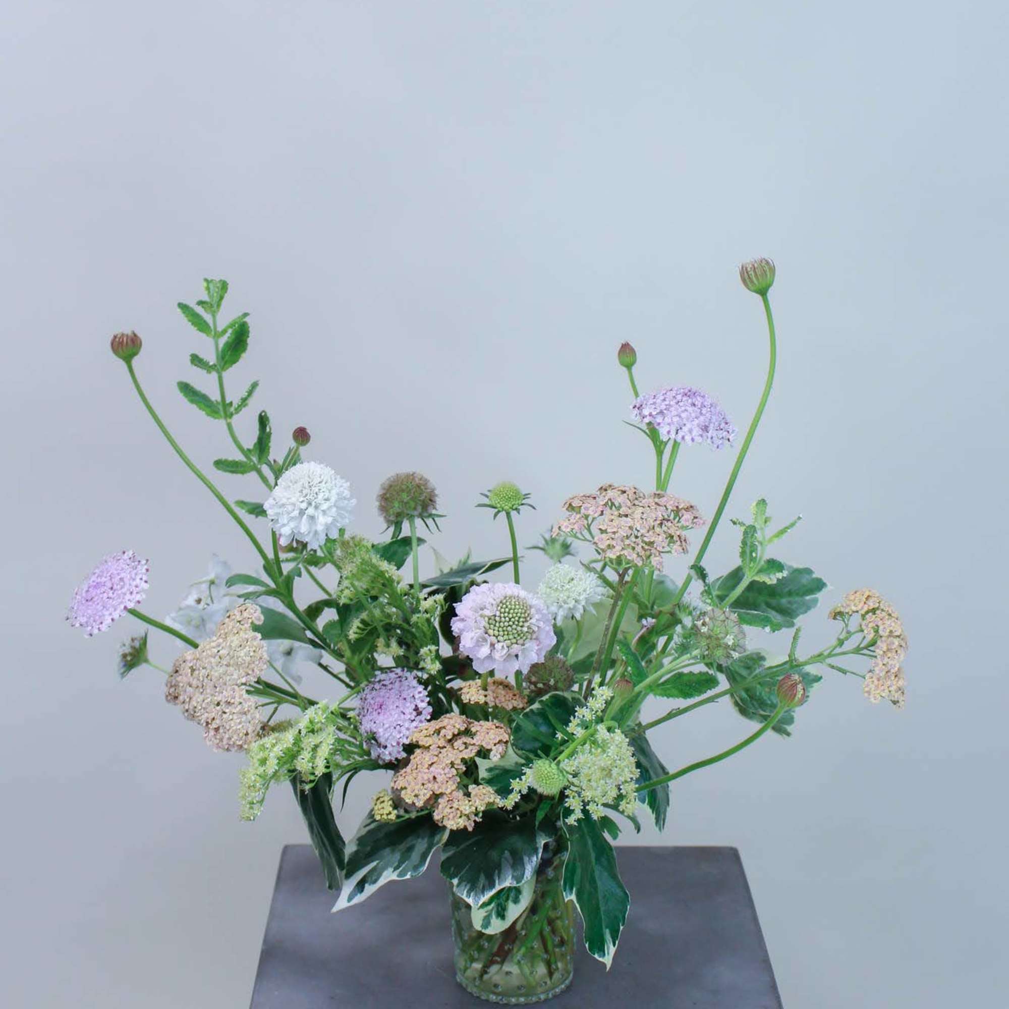 Using texture, shape and color, this small wild flower bouquet is perfect