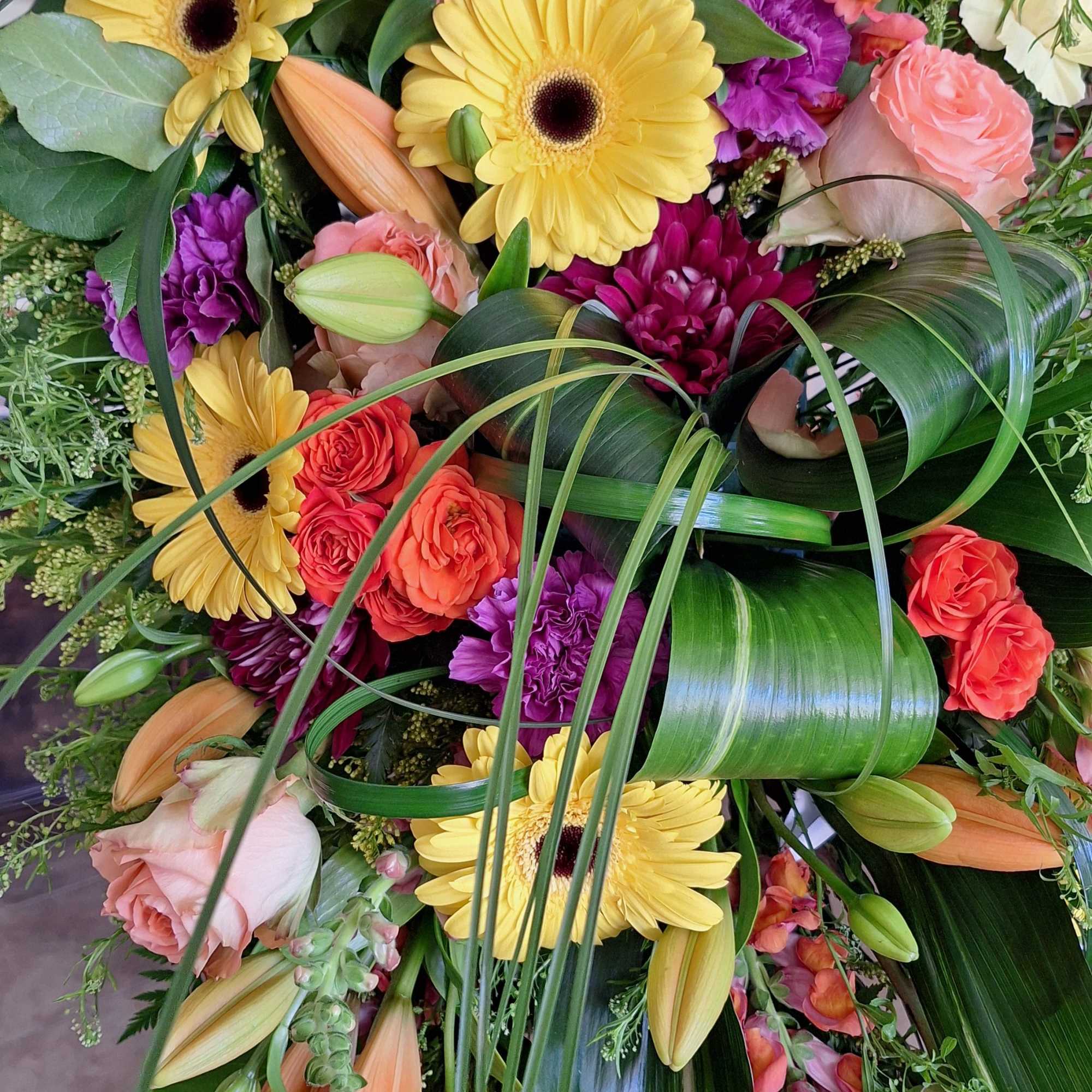 A beautiful mix of flowers that is bright and sweet for your