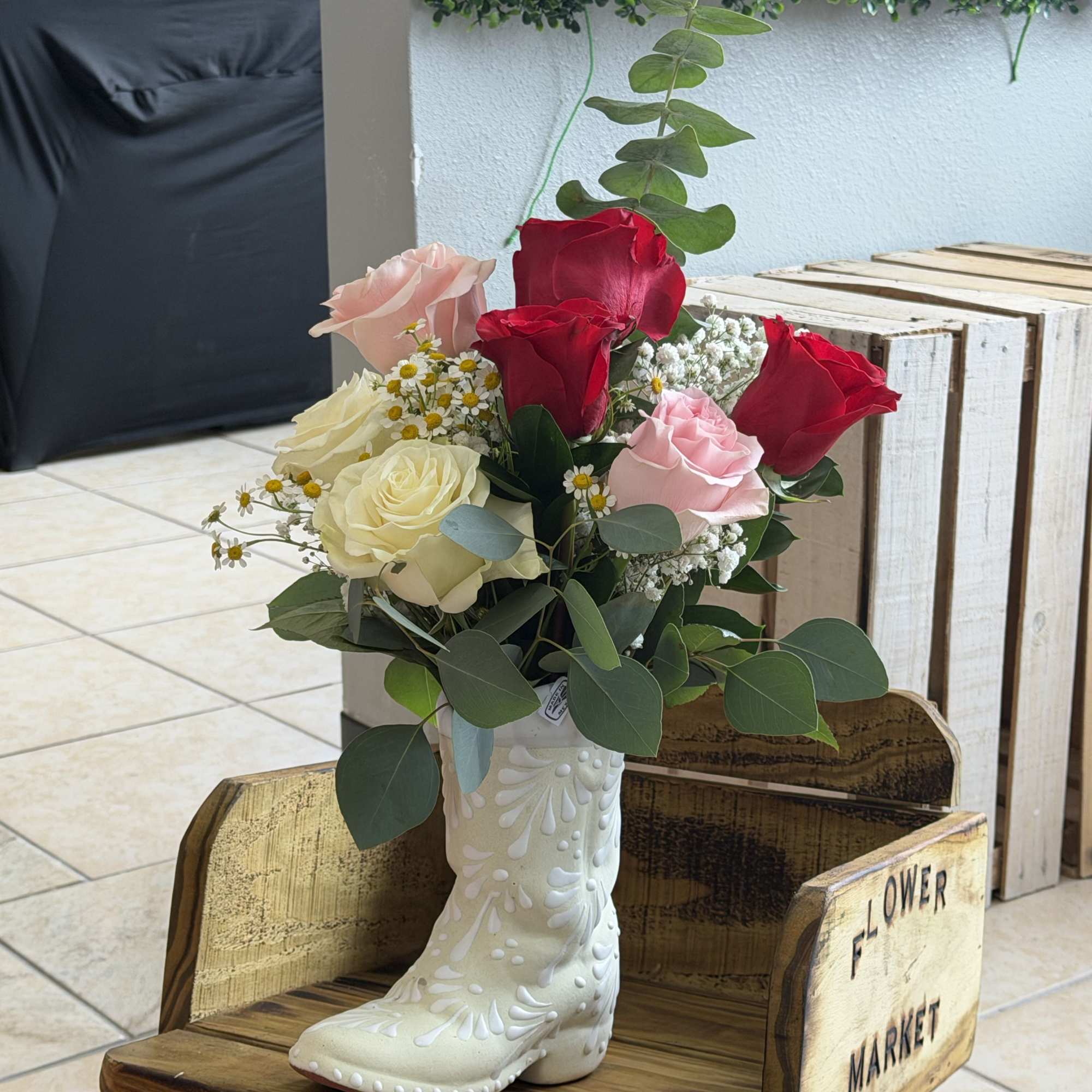 Red and rosy charm makes this Mother's Day bouquet feel like a