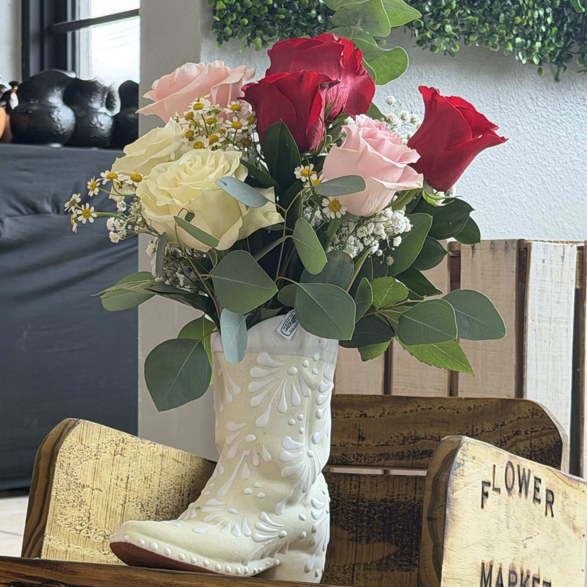 Red and rosy charm makes this Mother's Day bouquet feel like a