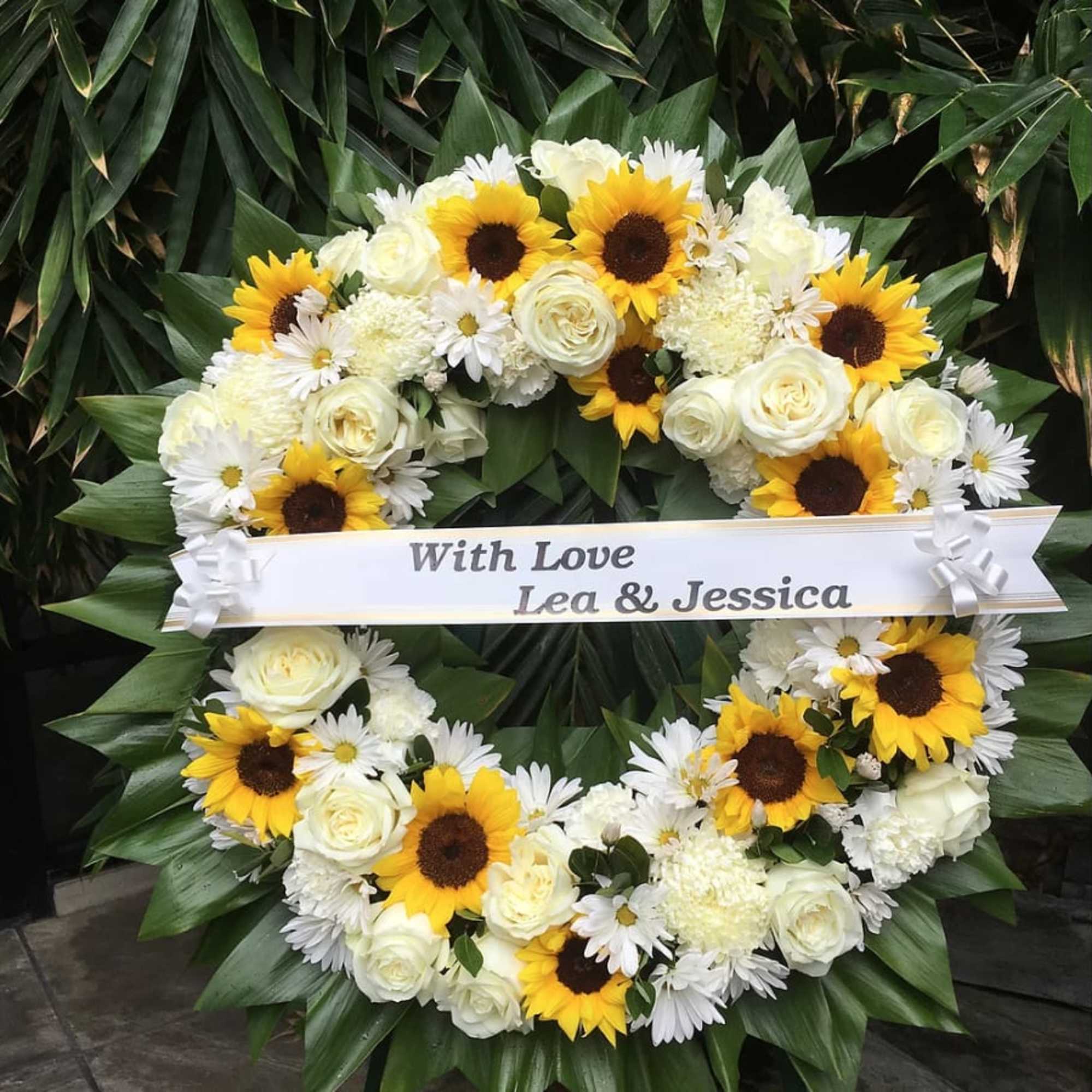 76 SUNFLOWERS OPEN WREATHby Stanley Ito Florist