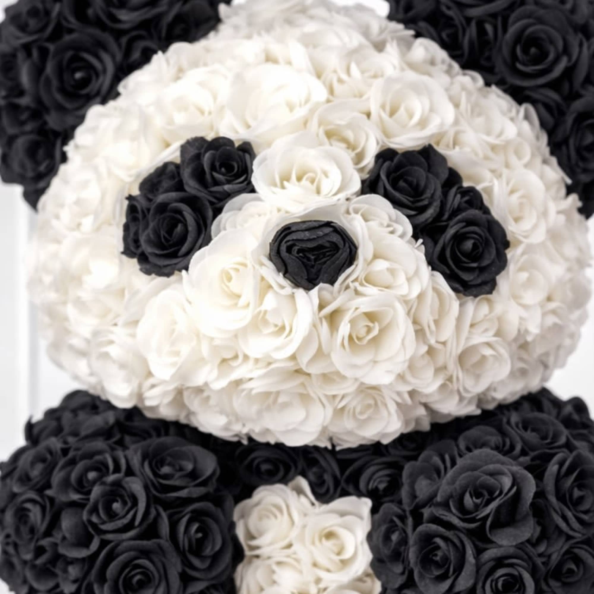 Black and white rose bouquet with a rounded, layered shape