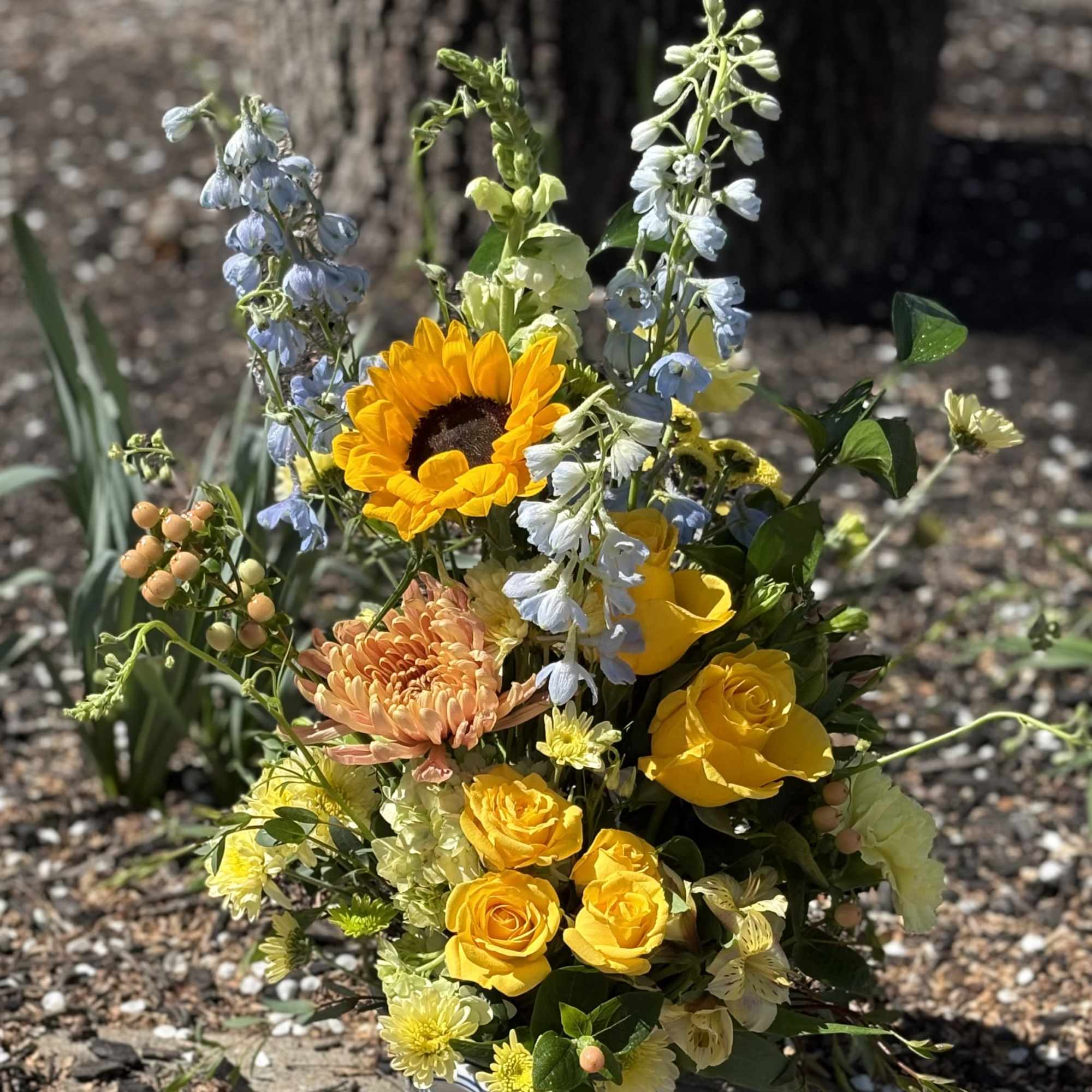 A bright and sunny arrangement designed to radiate warmth and happiness. Bold