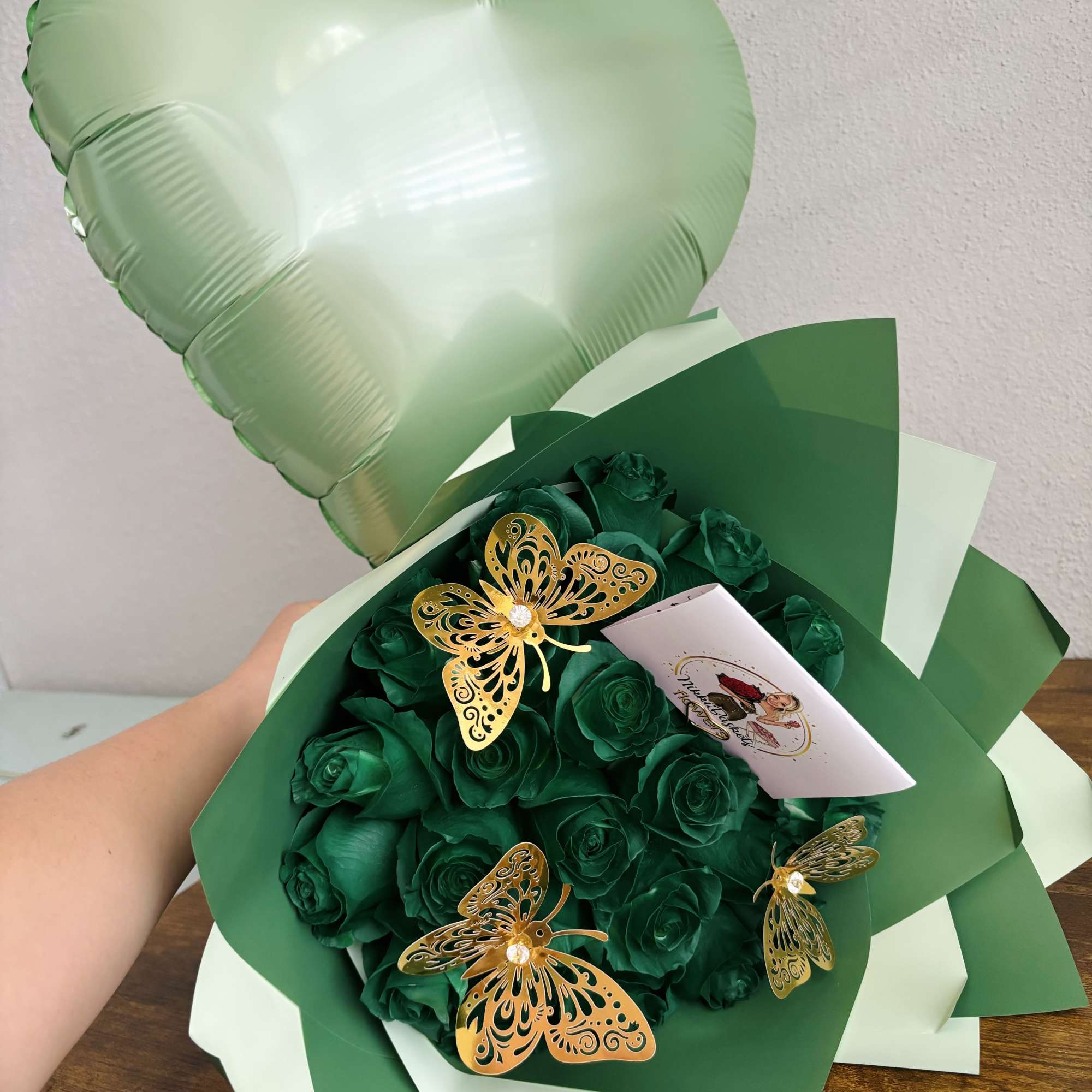  Green Roses Bouquet with Heart Balloon 

This elegant arrangement features the
