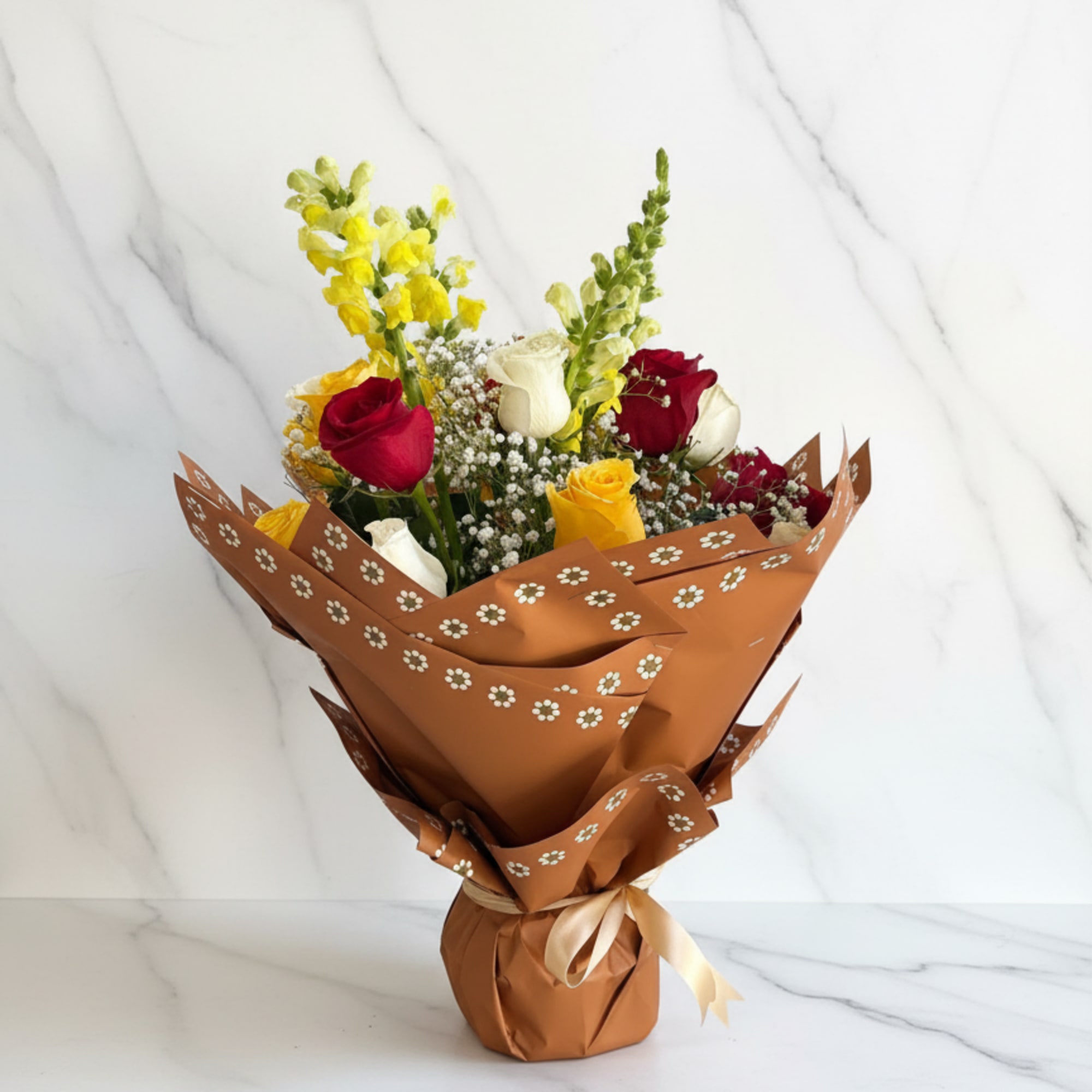 Delicate touches of baby&rsquo;s breath and fresh greenery add a soft, airy