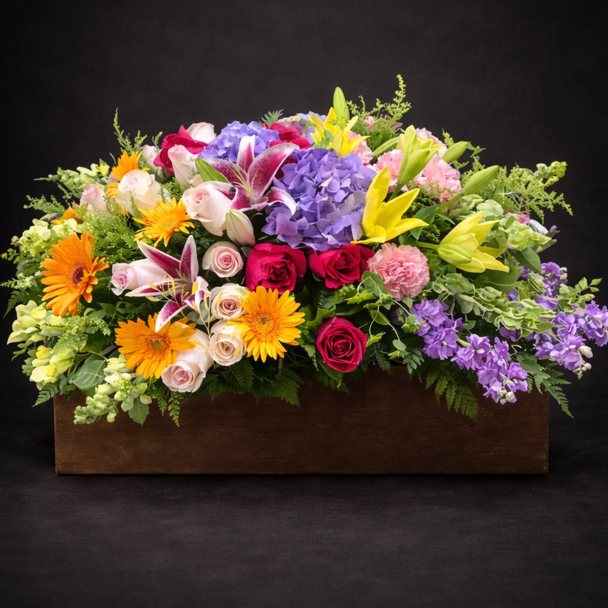 This beautiful casket spray make with lavender hydrangea and stock  
