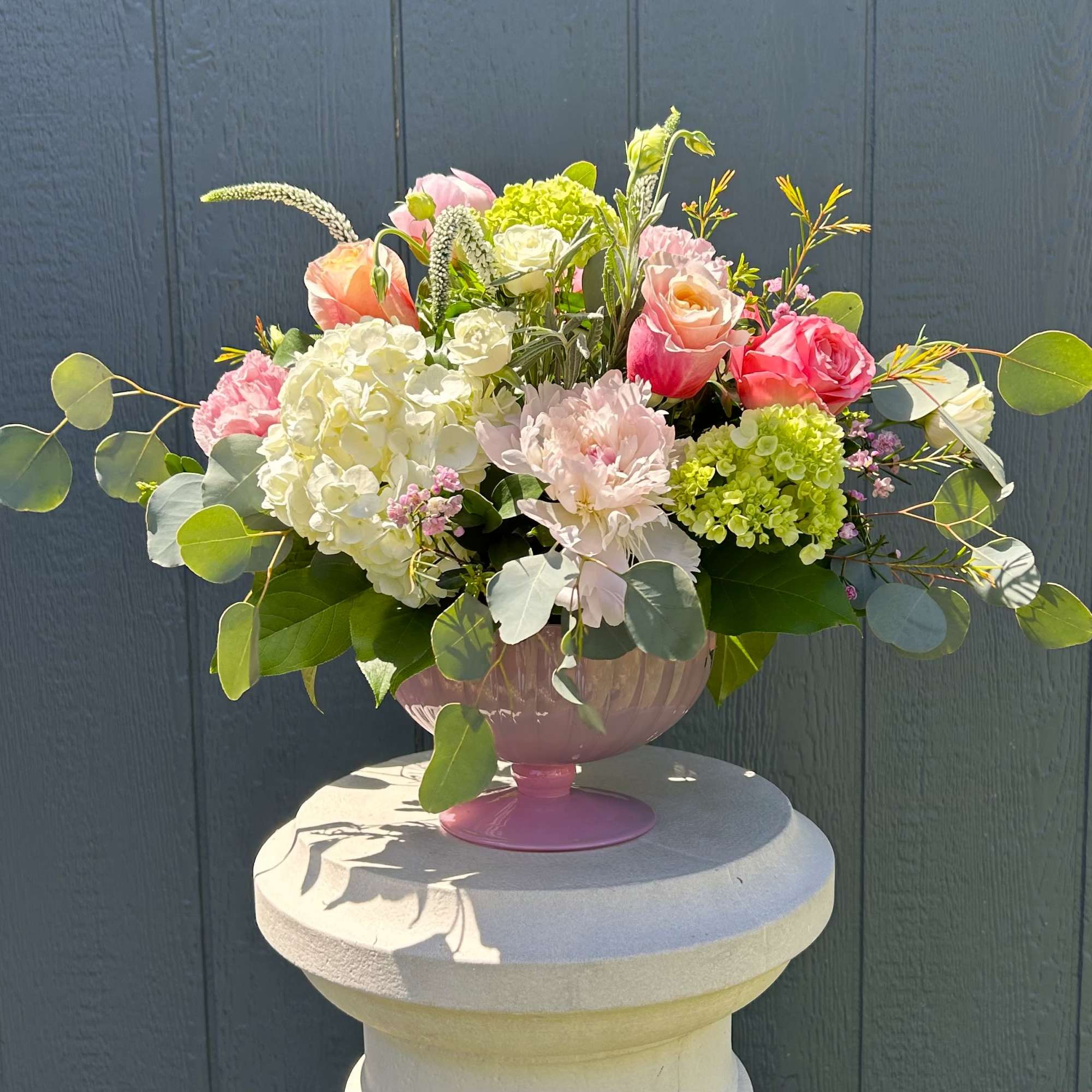 Mother's Love is a beautiful, lush centerpiece with Peonies &amp; Garden Roses