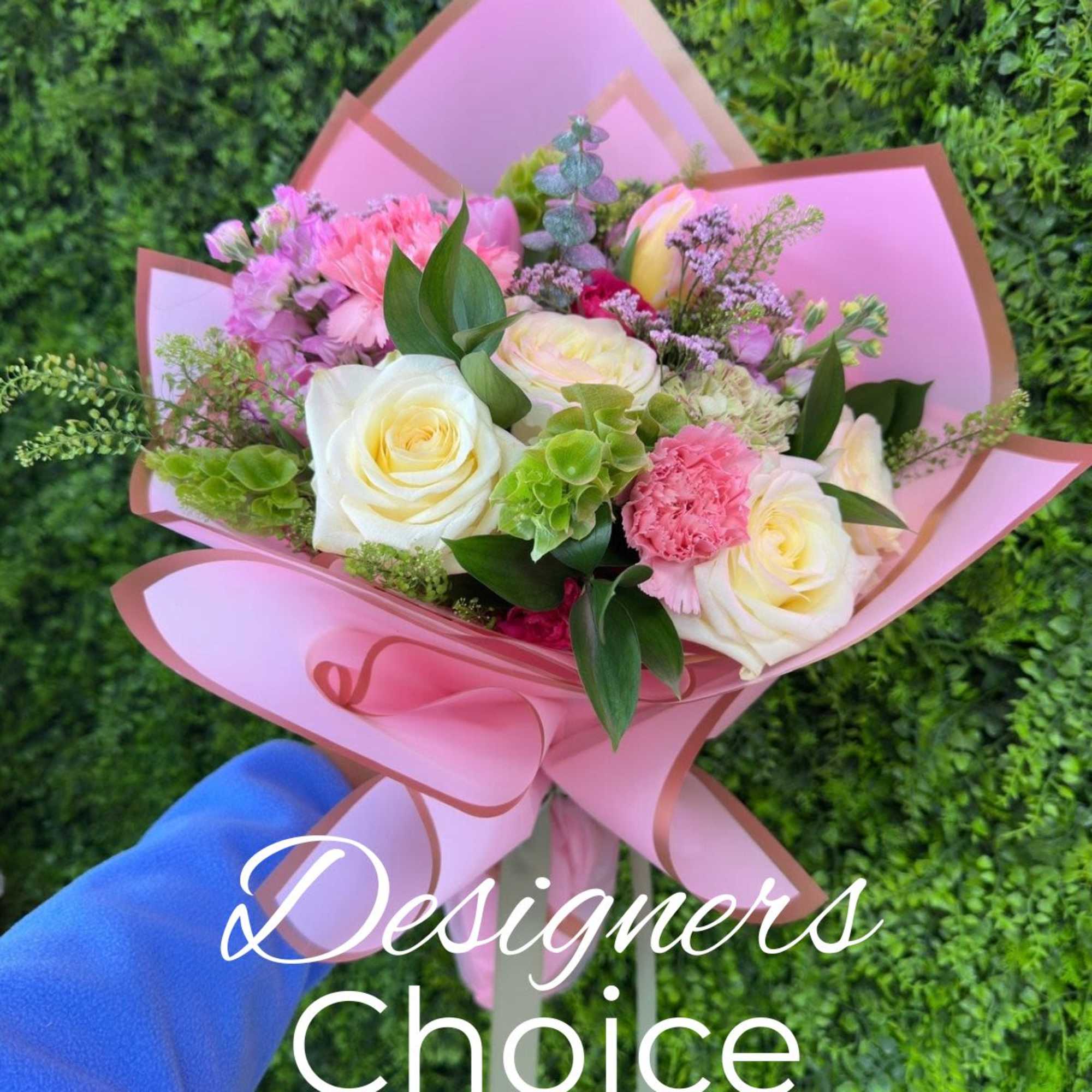 Pink and white mixed bouquet wrapped in pink paper